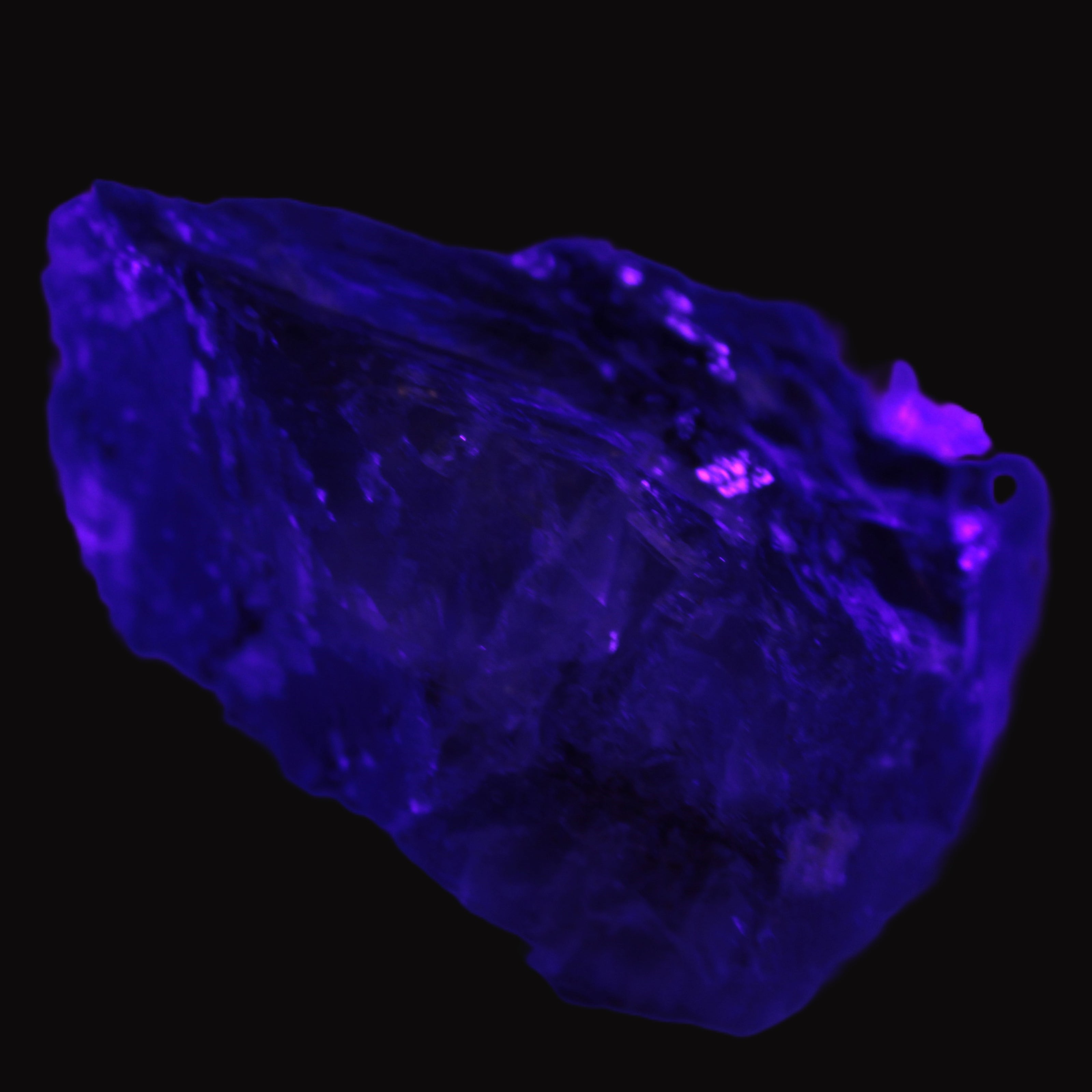 Cubic Blue Fluorite  with Clear Calcite cluster in UV light