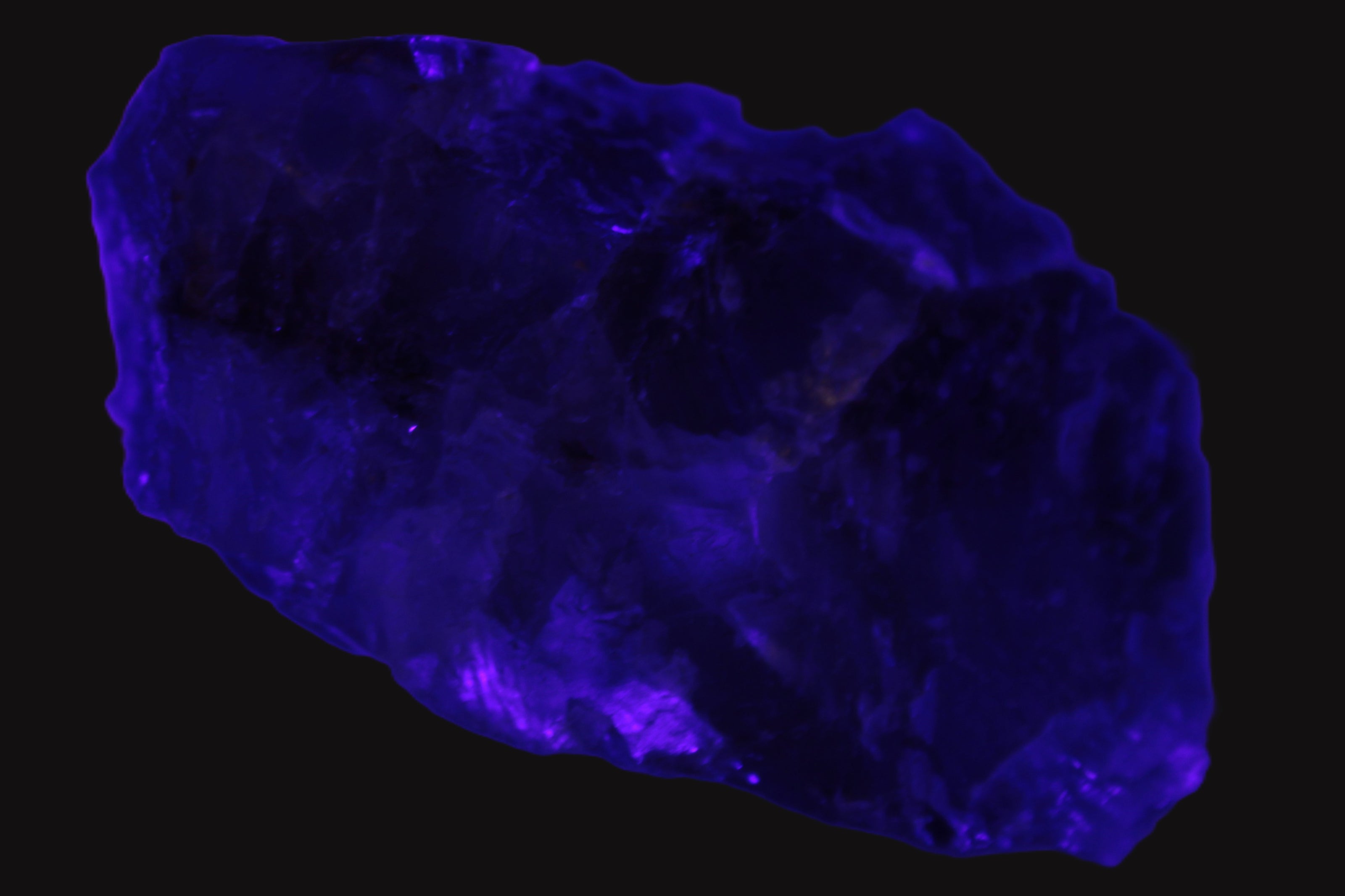 Cubic Blue Fluorite  with Clear Calcite cluster in UV light