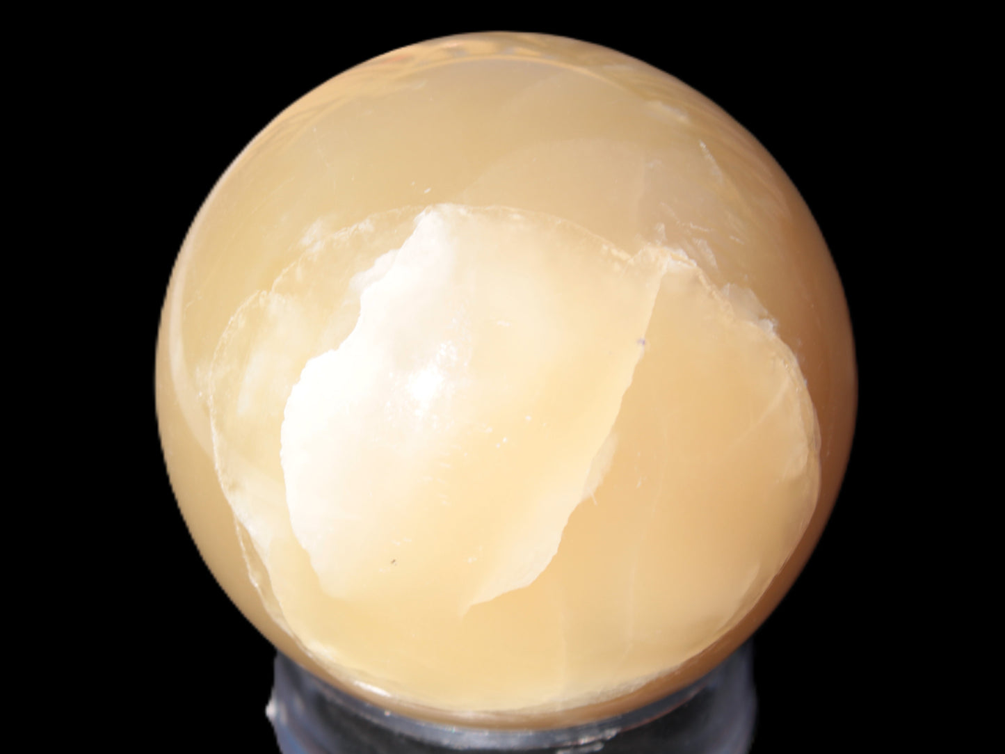 Topaz Honey Calcite sphere 63mm 341g Rocks and Things