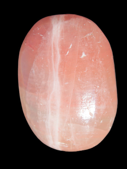 Pink Sorbet Calcite palm stone 57-61mm 71-117g in sunlight - Rocks and Things Store