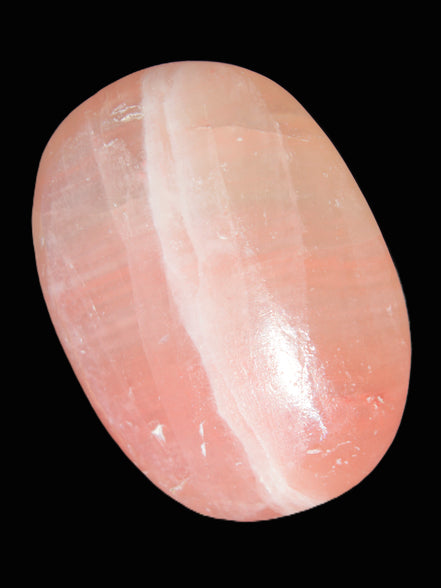 Pink Sorbet Calcite palm stone 57-61mm 71-117g in sunlight - Rocks and Things Store