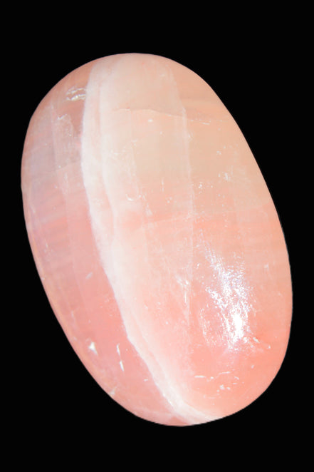 Pink Sorbet Calcite palm stone 57-61mm 71-117g in sunlight - Rocks and Things Store