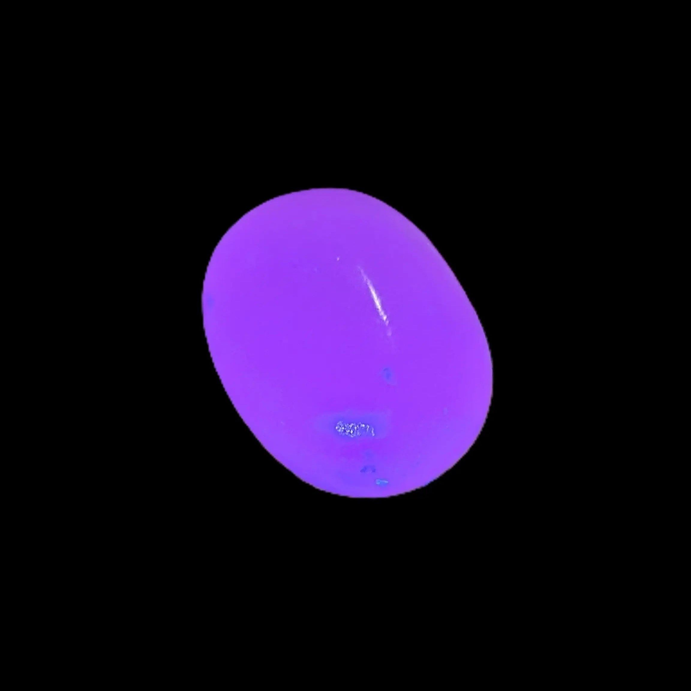 Mangano Calcite UV bright-pink-reactive tumbled stone 4-6g Rocks and Things