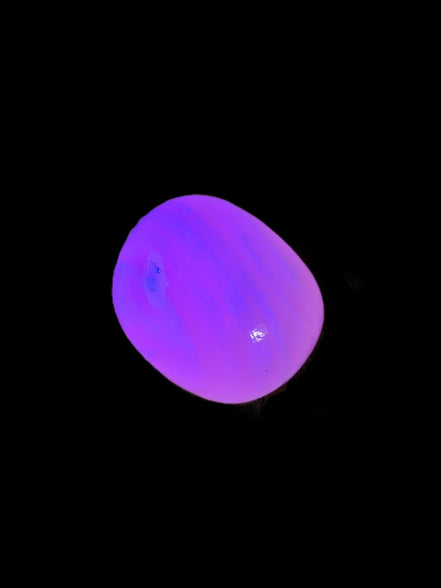 Mangano Calcite UV bright-pink-reactive tumbled stone 4-6g Rocks and Things