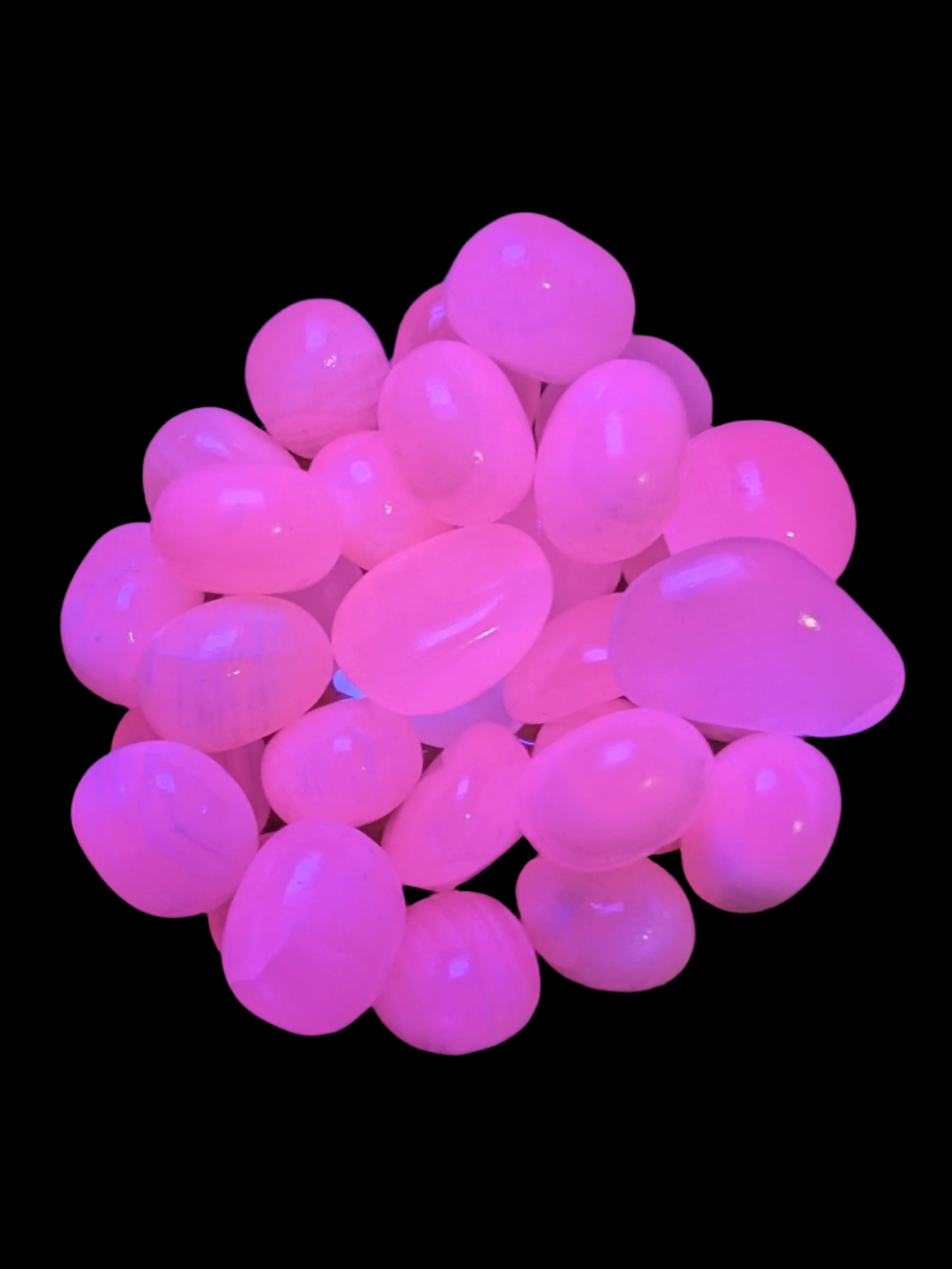 Mangano Calcite UV bright-pink-reactive tumbled stone 4-6g Rocks and Things