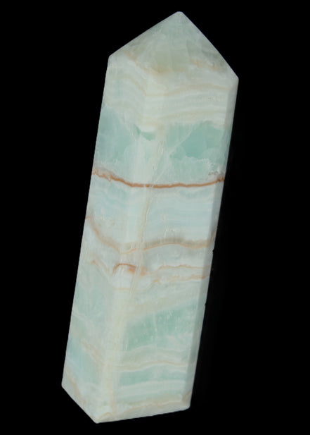 Pistachio Calcite obelisk 131*37*30mm 324g in sunlight - Rocks and Things Store