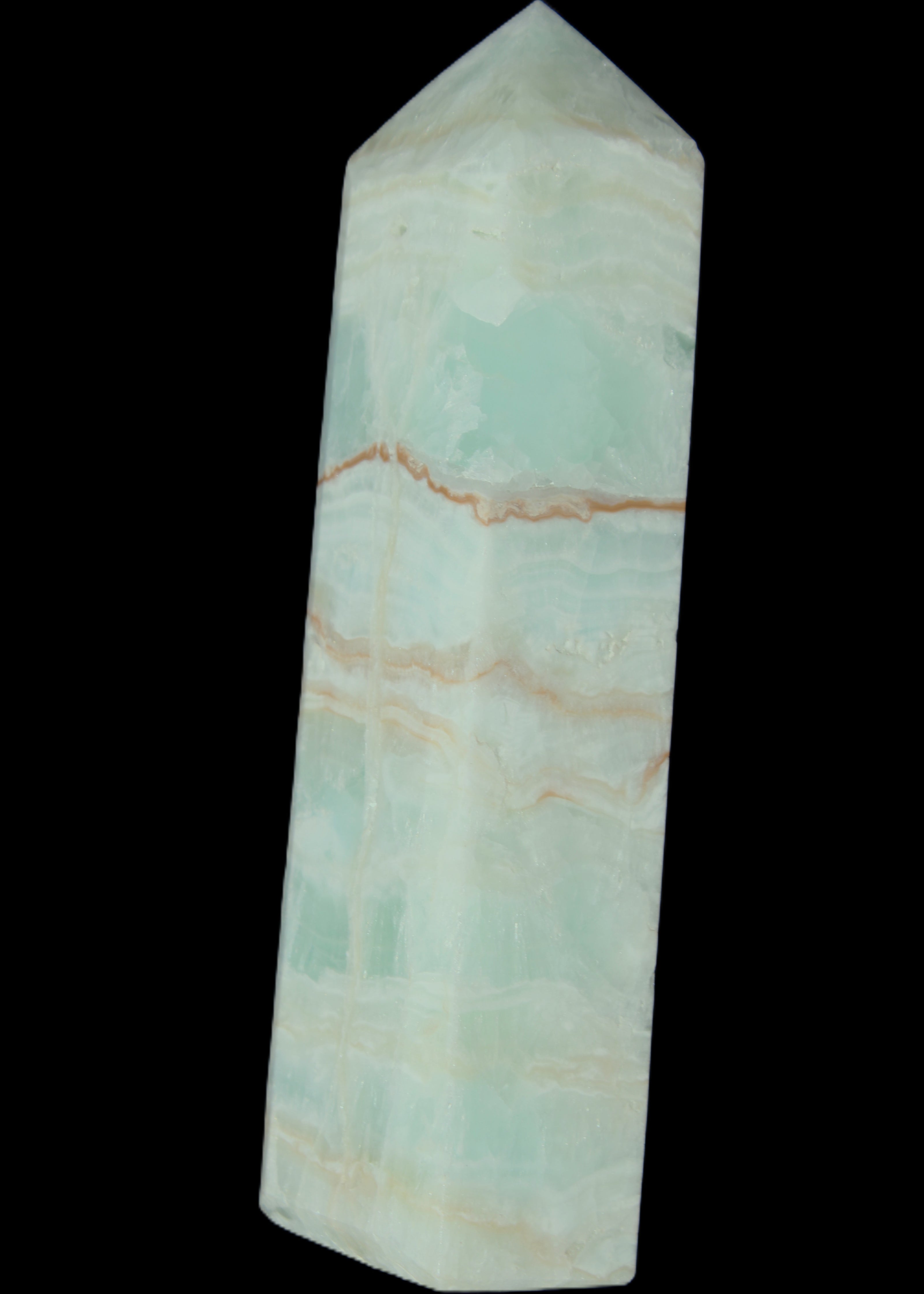 Pistachio Calcite obelisk 131*37*30mm 324g in sunlight - Rocks and Things Store