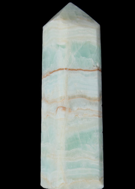 Pistachio Calcite obelisk 131*37*30mm 324g in sunlight - Rocks and Things Store