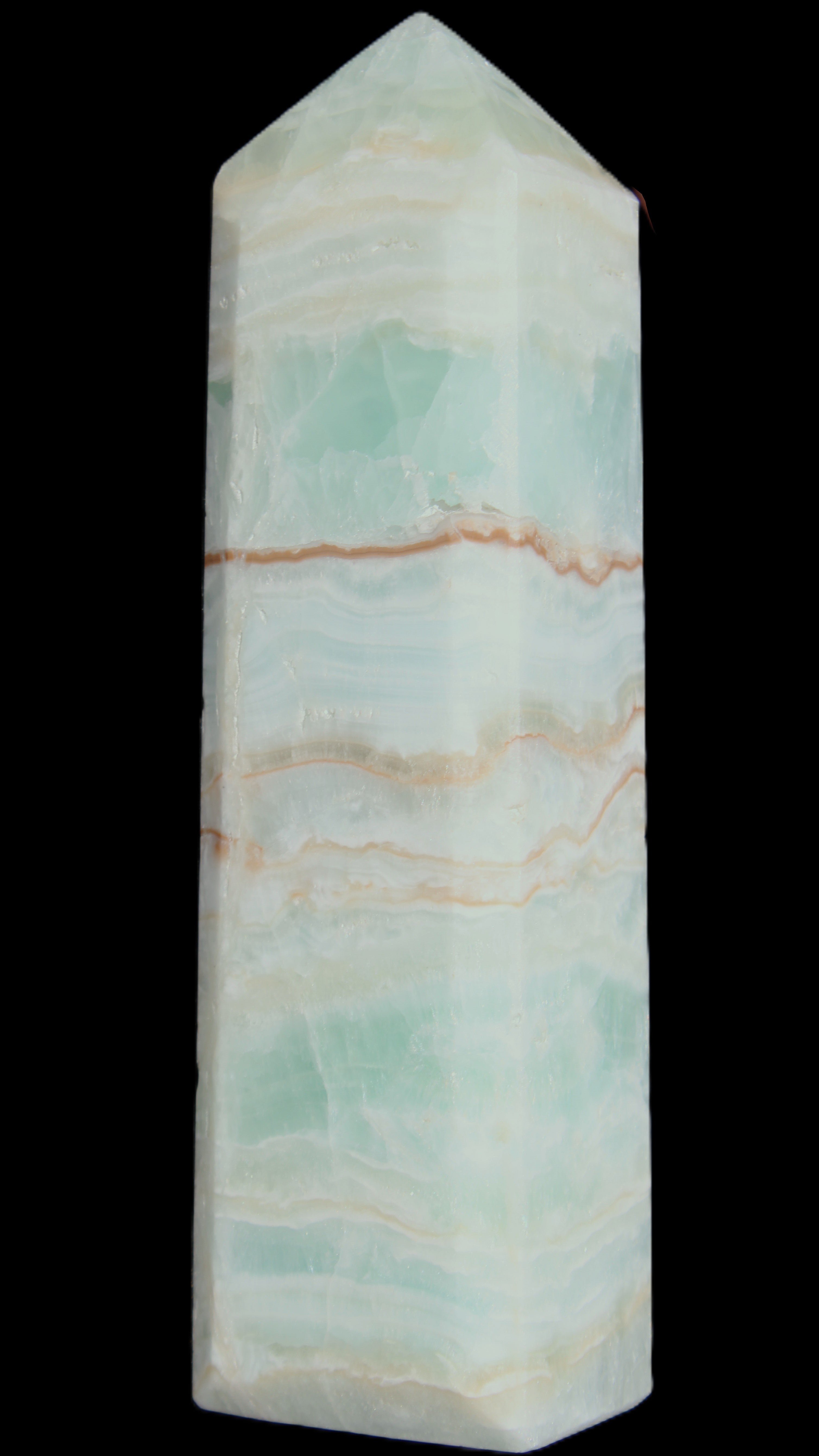 Pistachio Calcite obelisk 131*37*30mm 324g in sunlight - Rocks and Things Store
