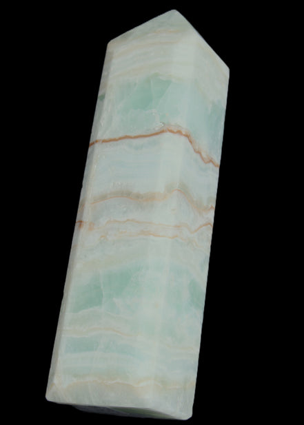 Pistachio Calcite obelisk 131*37*30mm 324g in sunlight - Rocks and Things Store
