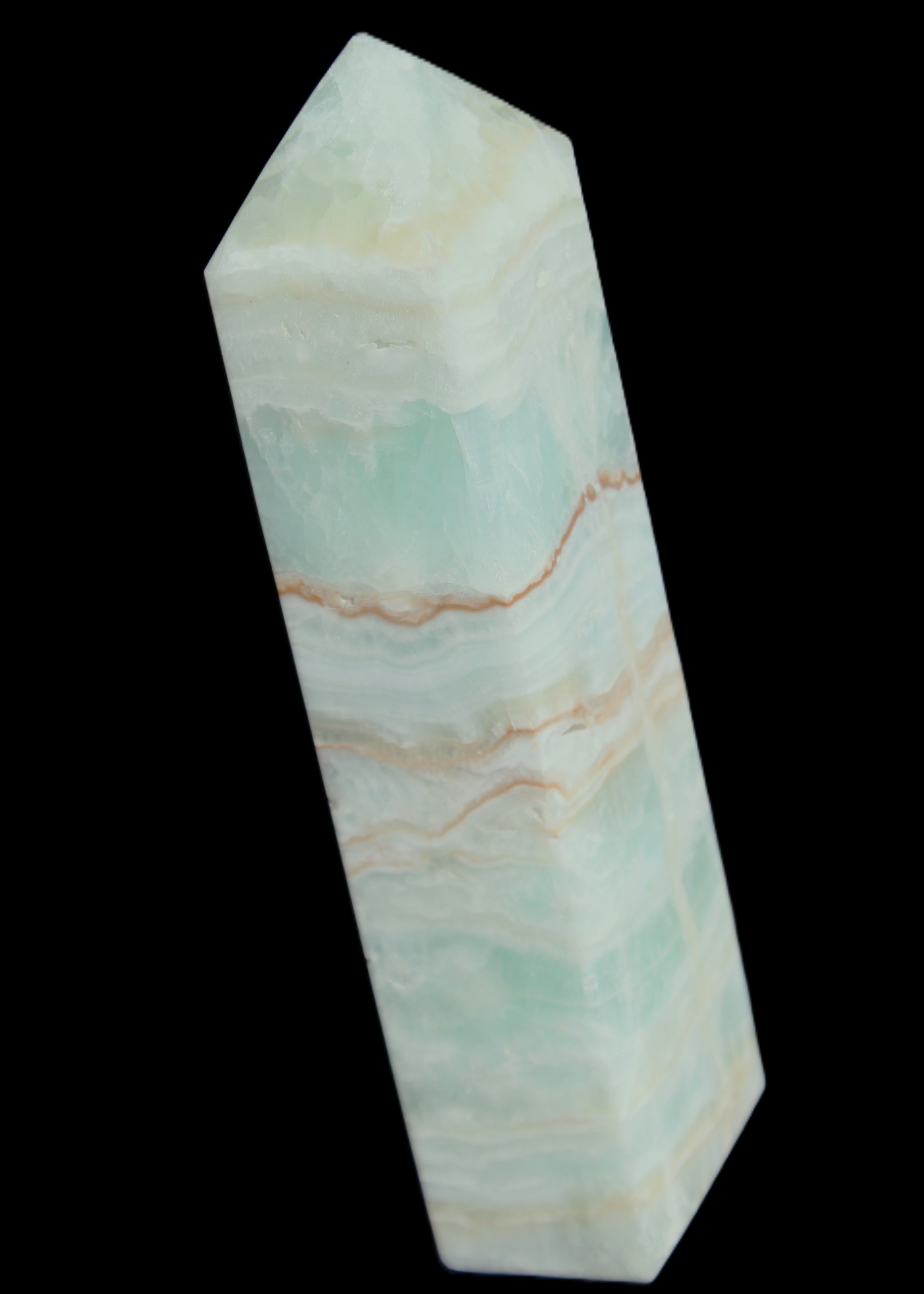 Pistachio Calcite obelisk 131*37*30mm 324g in sunlight - Rocks and Things Store