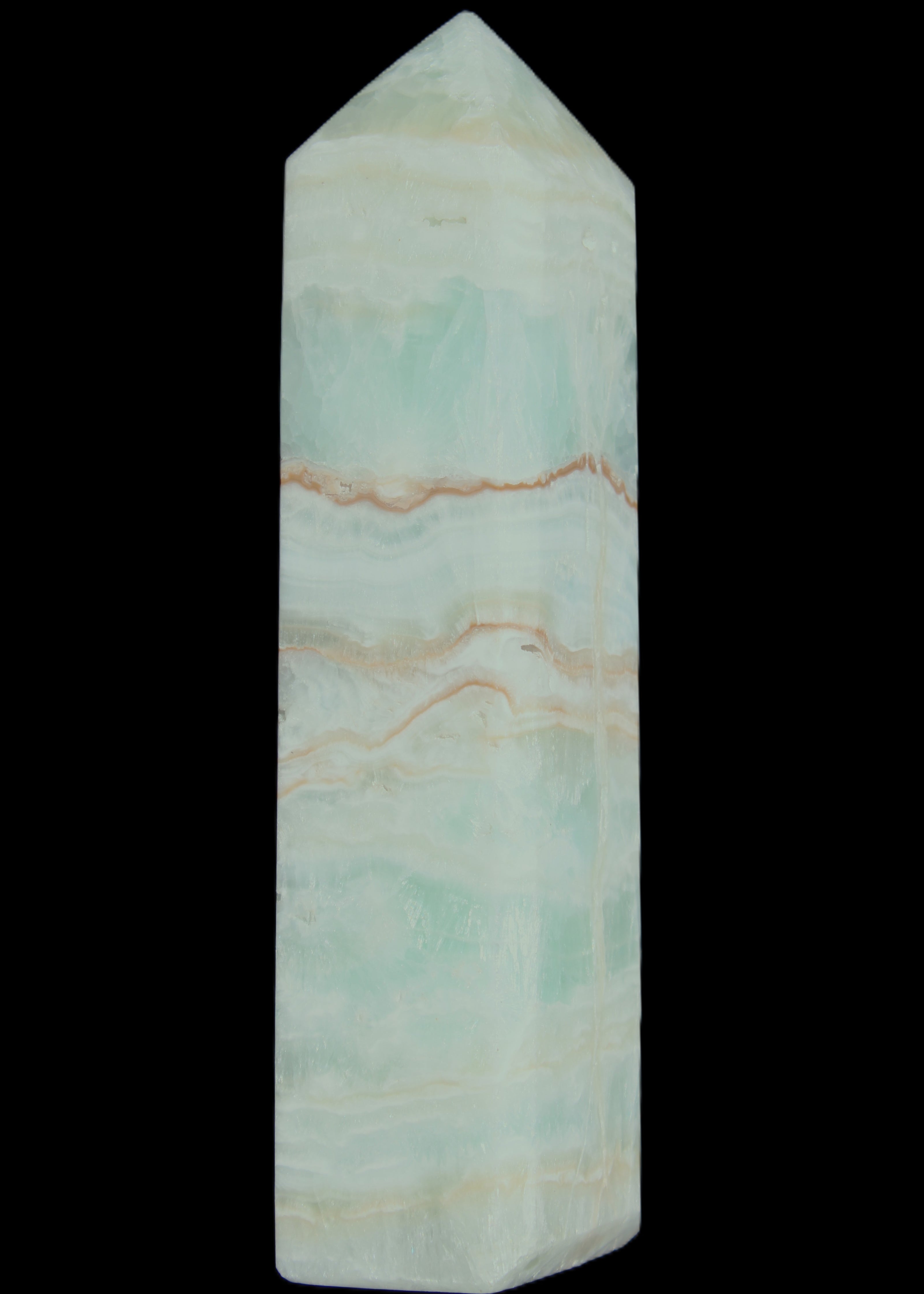 Pistachio Calcite obelisk 131*37*30mm 324g in sunlight - Rocks and Things Store