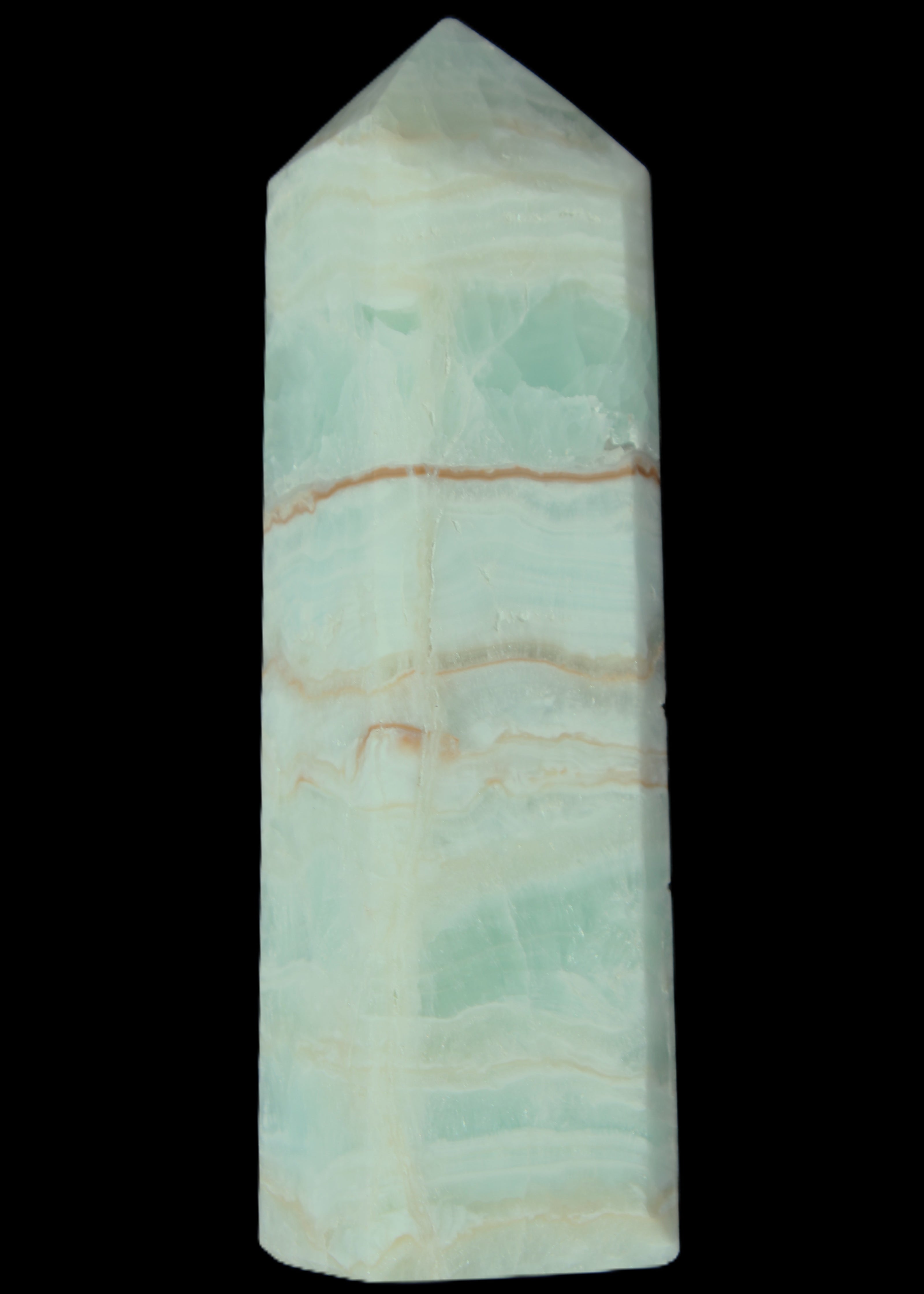 Pistachio Calcite obelisk 131*37*30mm 324g in sunlight - Rocks and Things Store