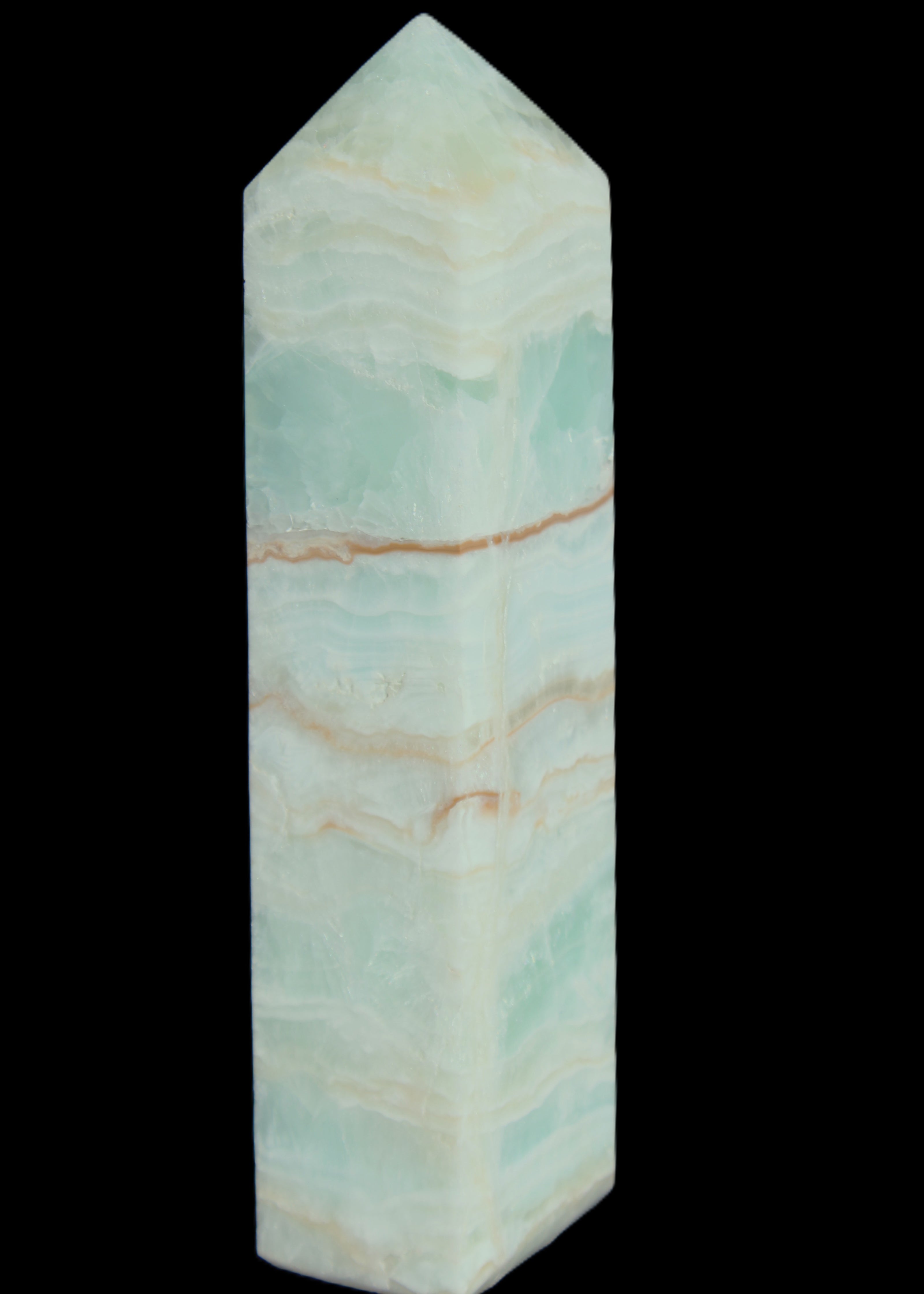 Pistachio Calcite obelisk 131*37*30mm 324g in sunlight - Rocks and Things Store