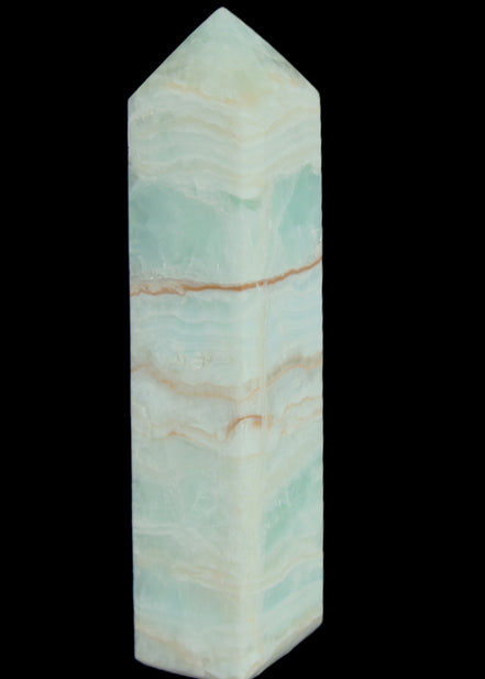 Pistachio Calcite obelisk 131*37*30mm 324g in sunlight - Rocks and Things Store