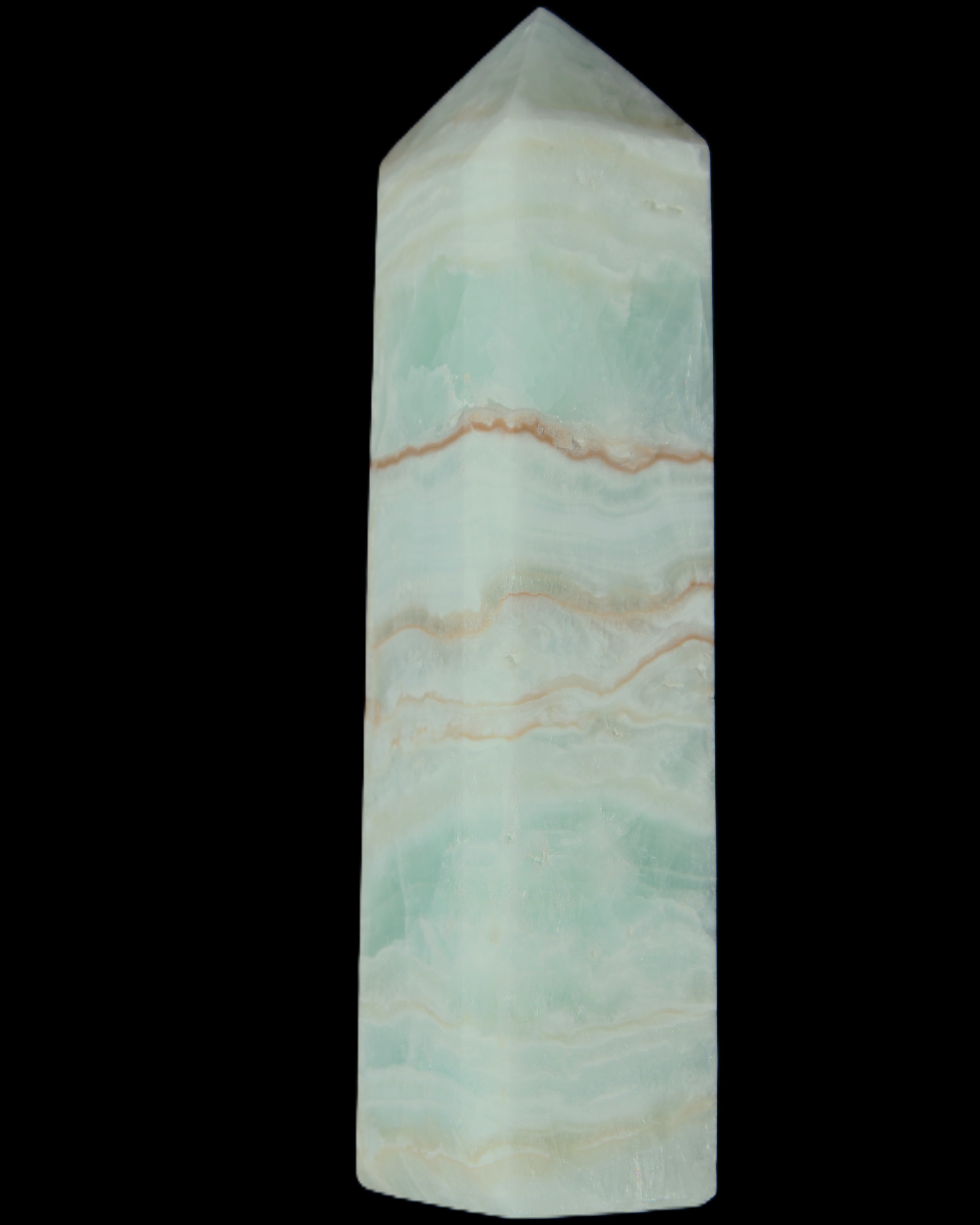 Pistachio Calcite obelisk 131*37*30mm 324g in sunlight - Rocks and Things Store