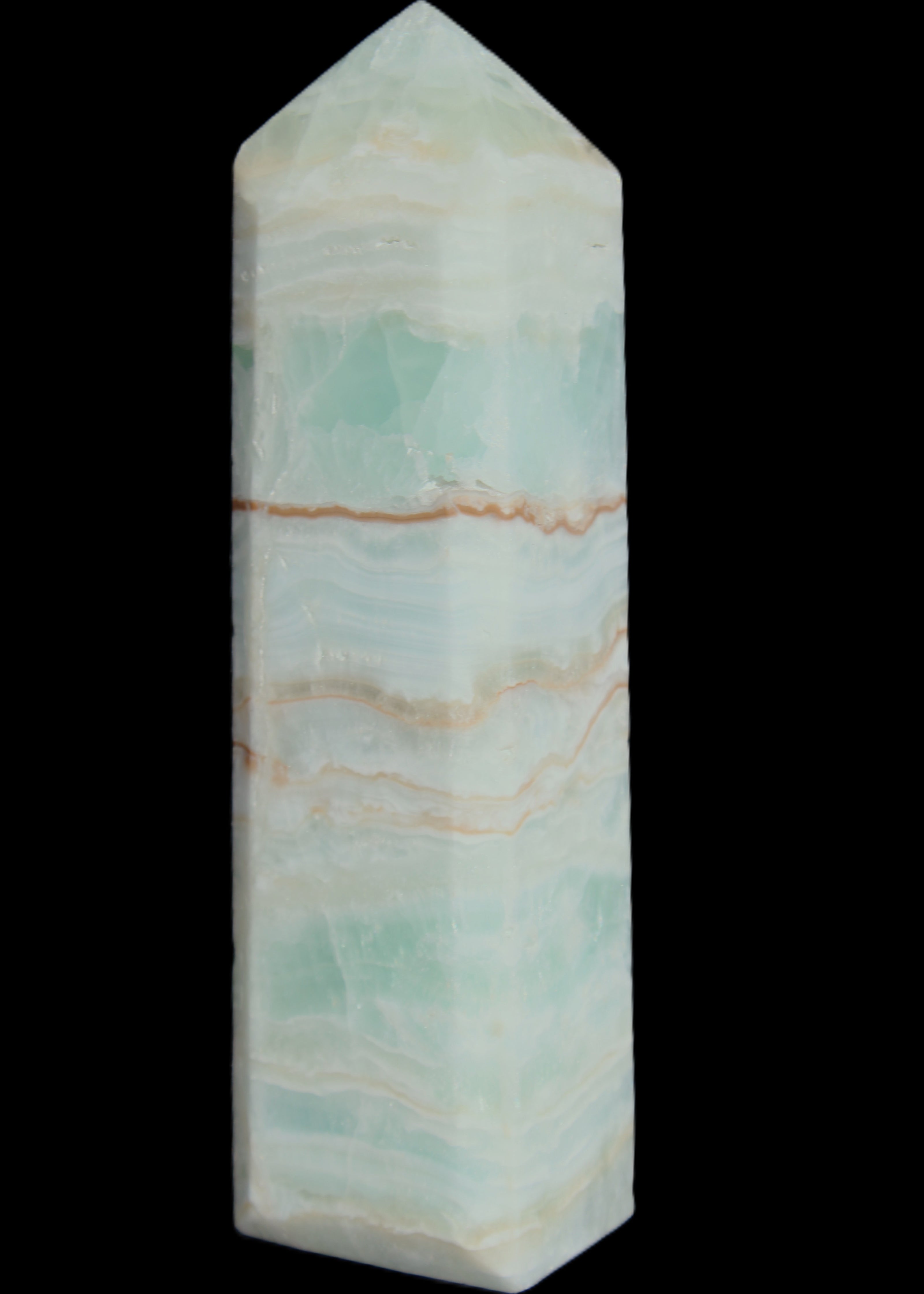 Pistachio Calcite obelisk 131*37*30mm 324g in sunlight - Rocks and Things Store