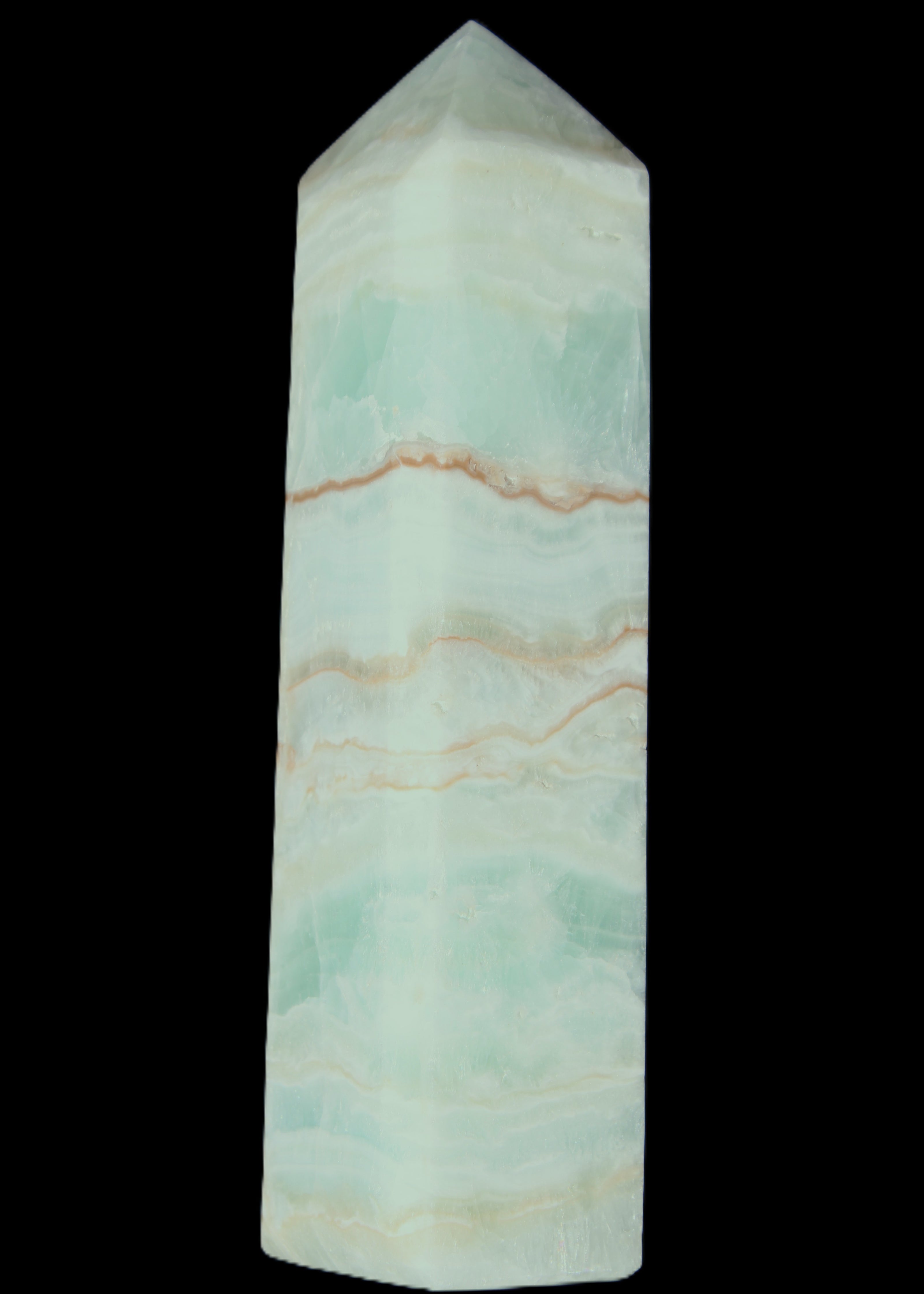 Pistachio Calcite obelisk 131*37*30mm 324g in sunlight - Rocks and Things Store
