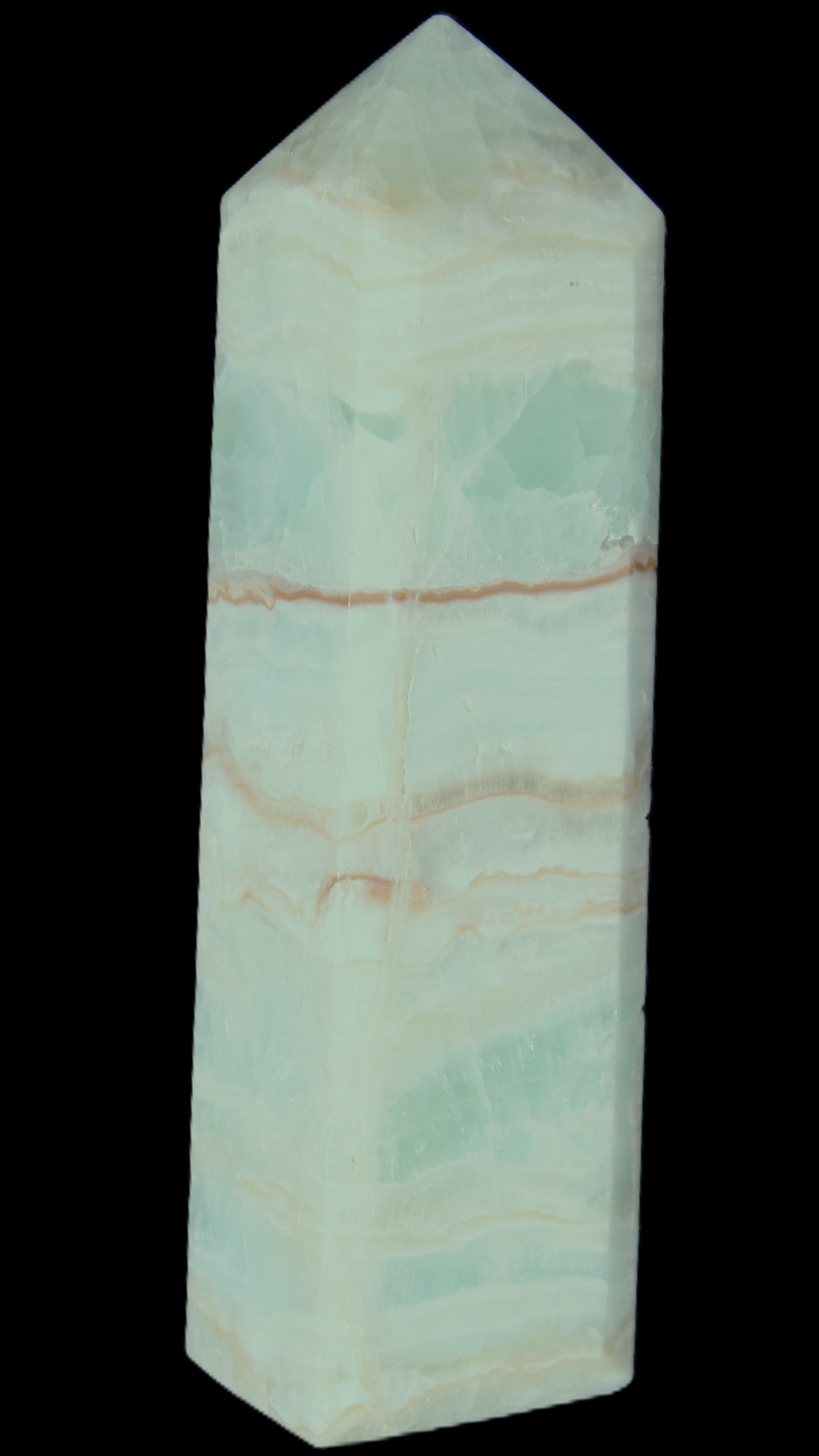 Pistachio Calcite obelisk 131*37*30mm 324g in sunlight - Rocks and Things Store