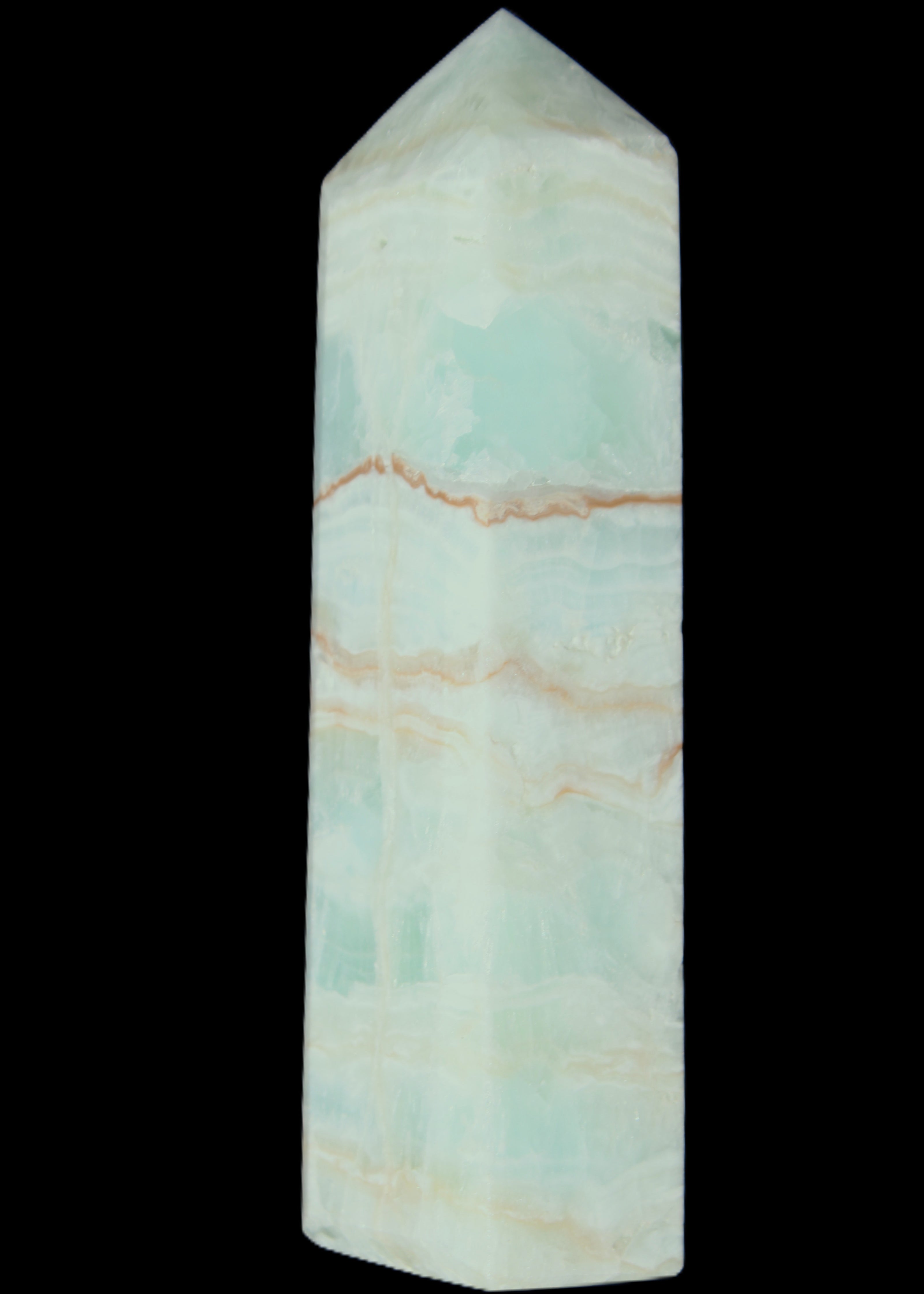 Pistachio Calcite obelisk 131*37*30mm 324g in sunlight - Rocks and Things Store