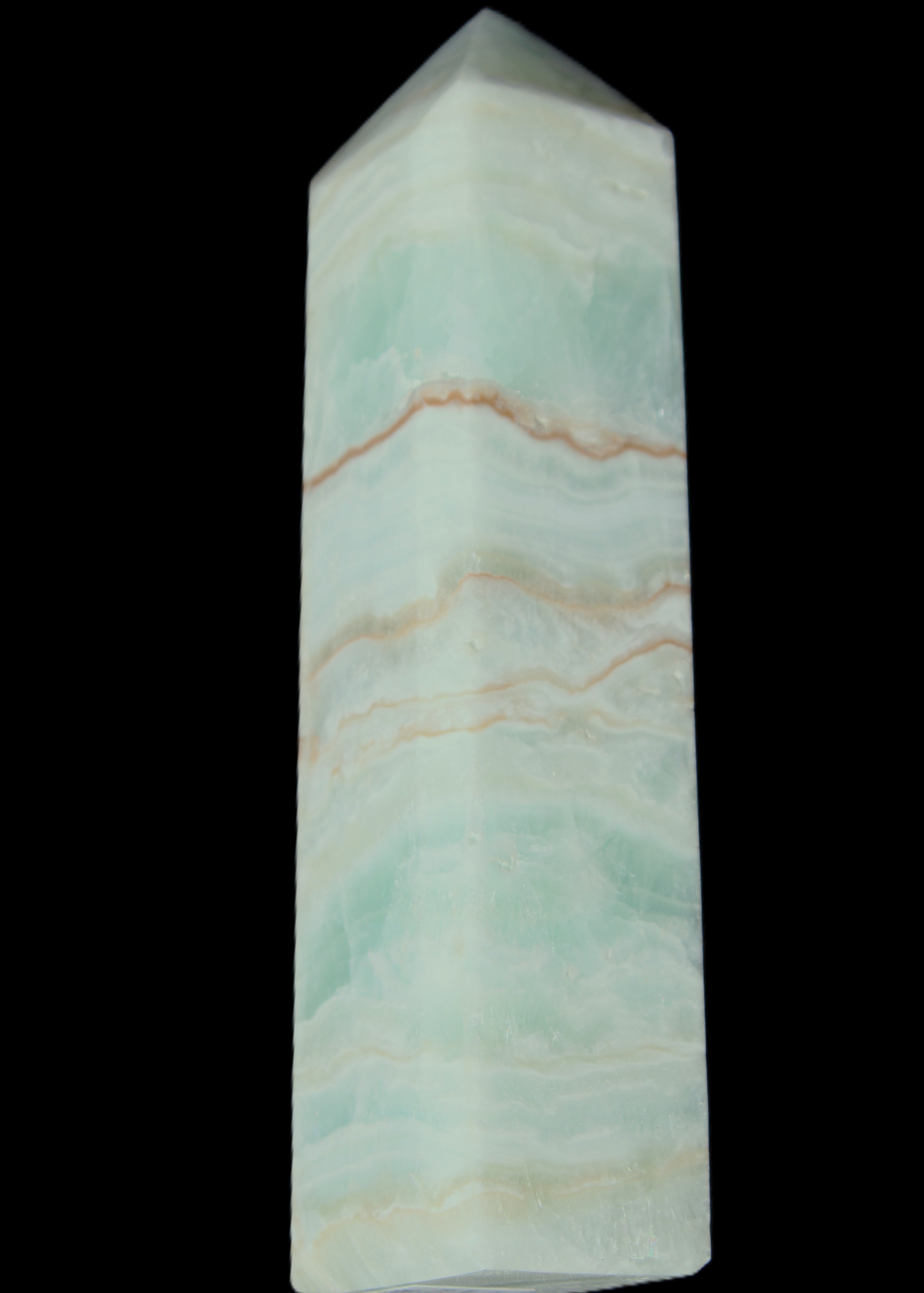 Pistachio Calcite obelisk 131*37*30mm 324g in sunlight - Rocks and Things Store