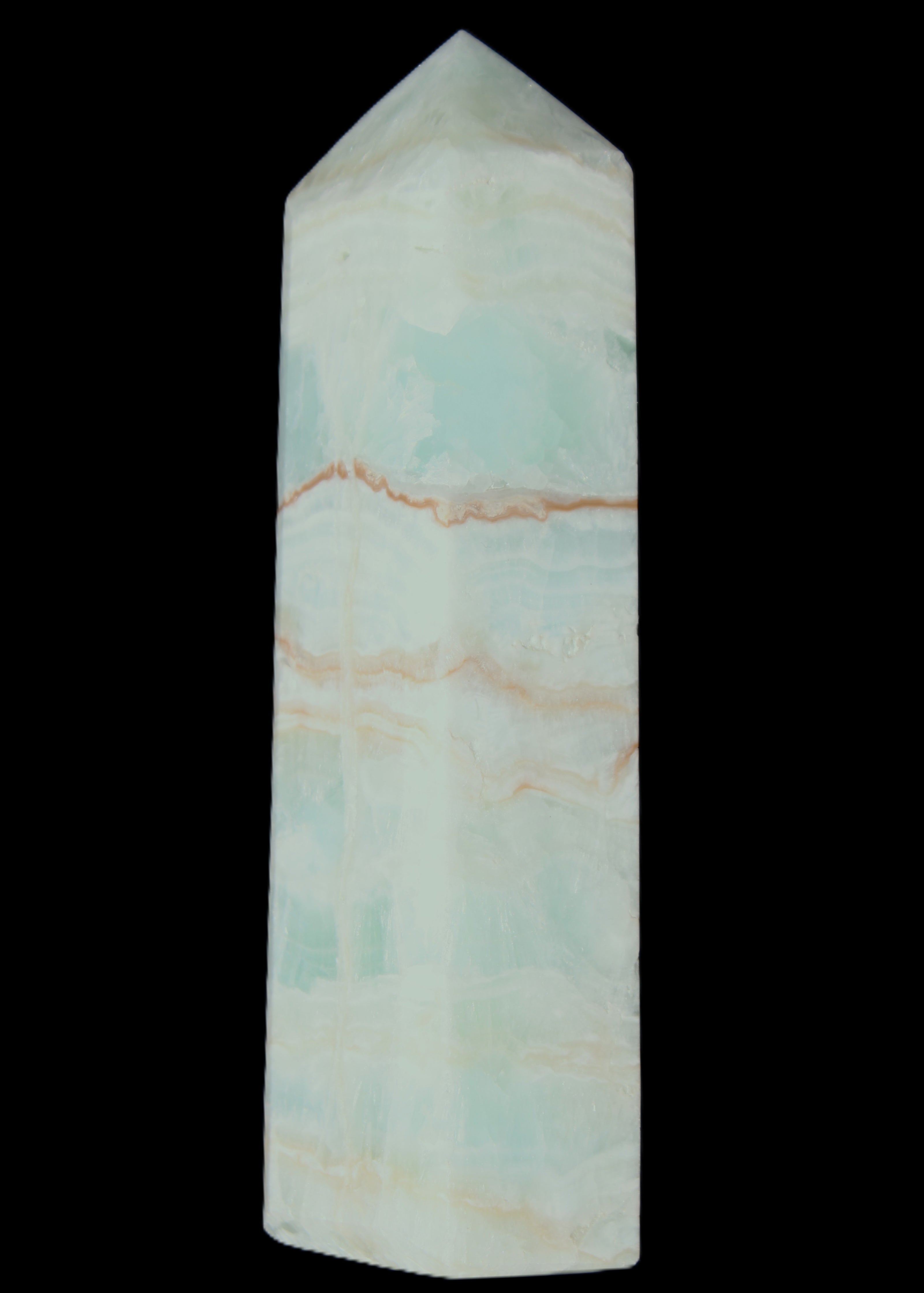 Pistachio Calcite obelisk 131*37*30mm 324g in sunlight - Rocks and Things Store