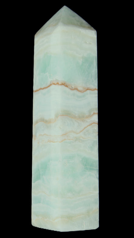 Pistachio Calcite obelisk 131*37*30mm 324g in sunlight - Rocks and Things Store
