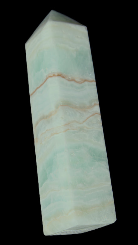Pistachio Calcite obelisk 131*37*30mm 324g in sunlight - Rocks and Things Store