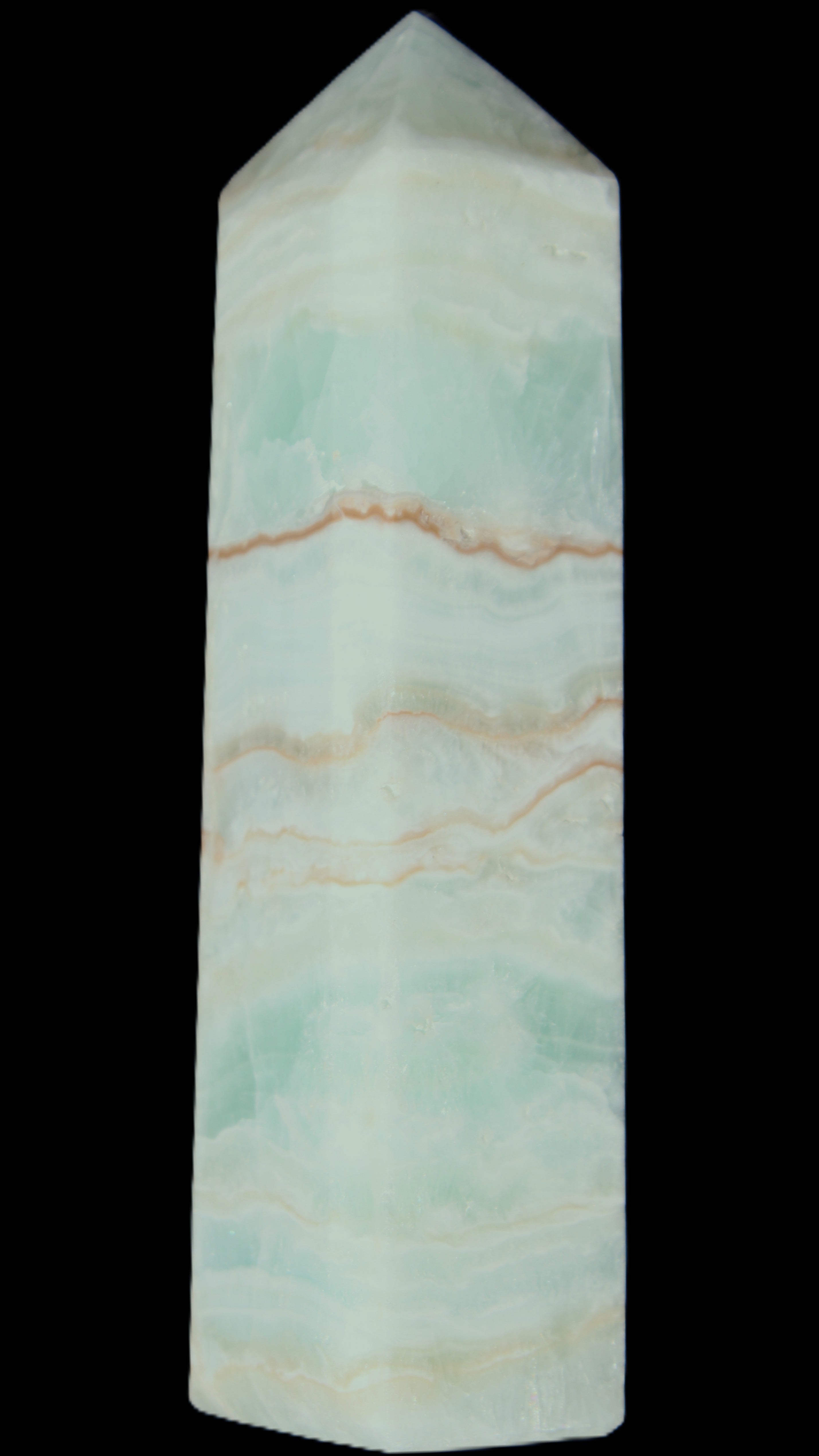 Pistachio Calcite obelisk 131*37*30mm 324g in sunlight - Rocks and Things Store