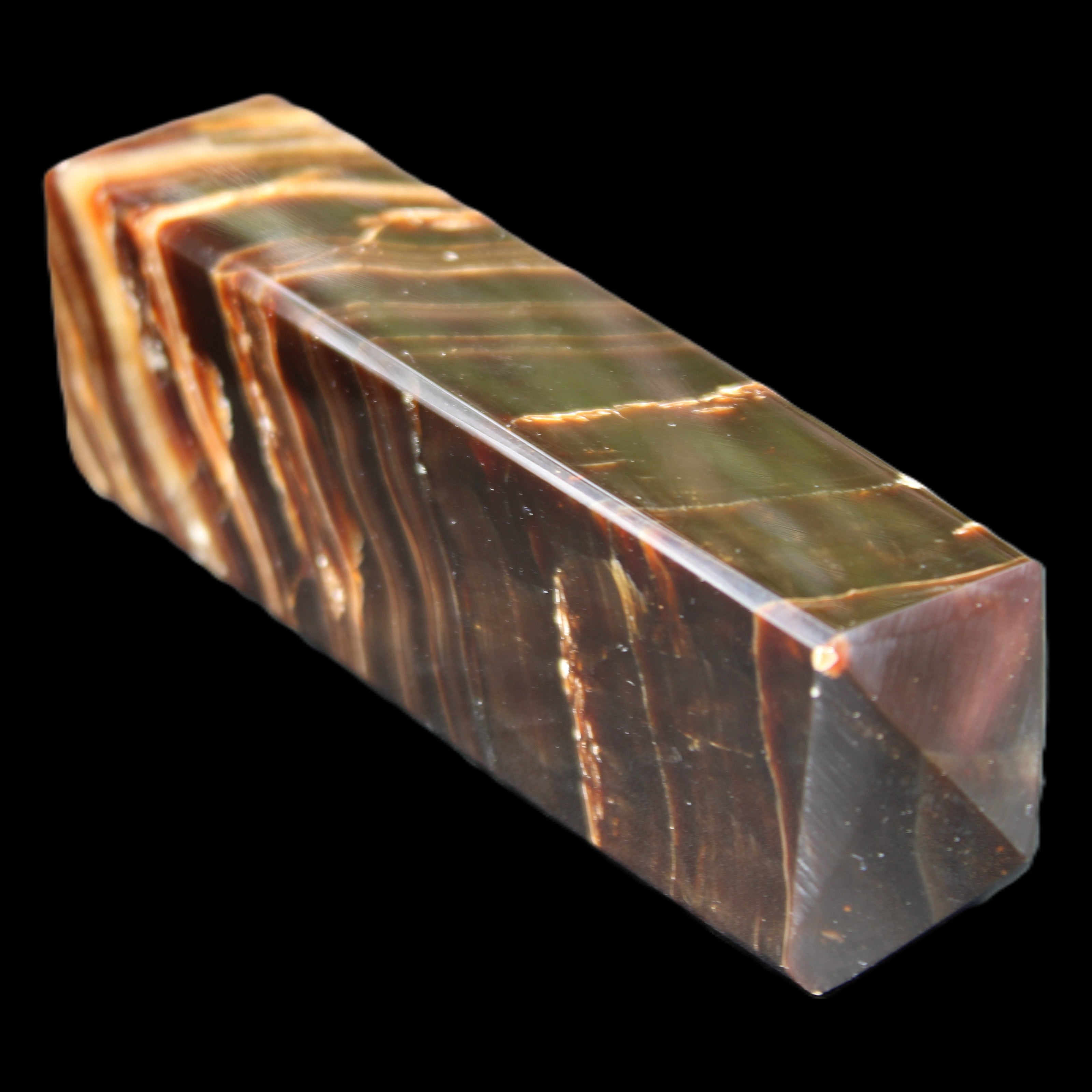 Chocolate Calcite obelisk 114*33*26mm 249g in sunlight - Rocks and Things Store