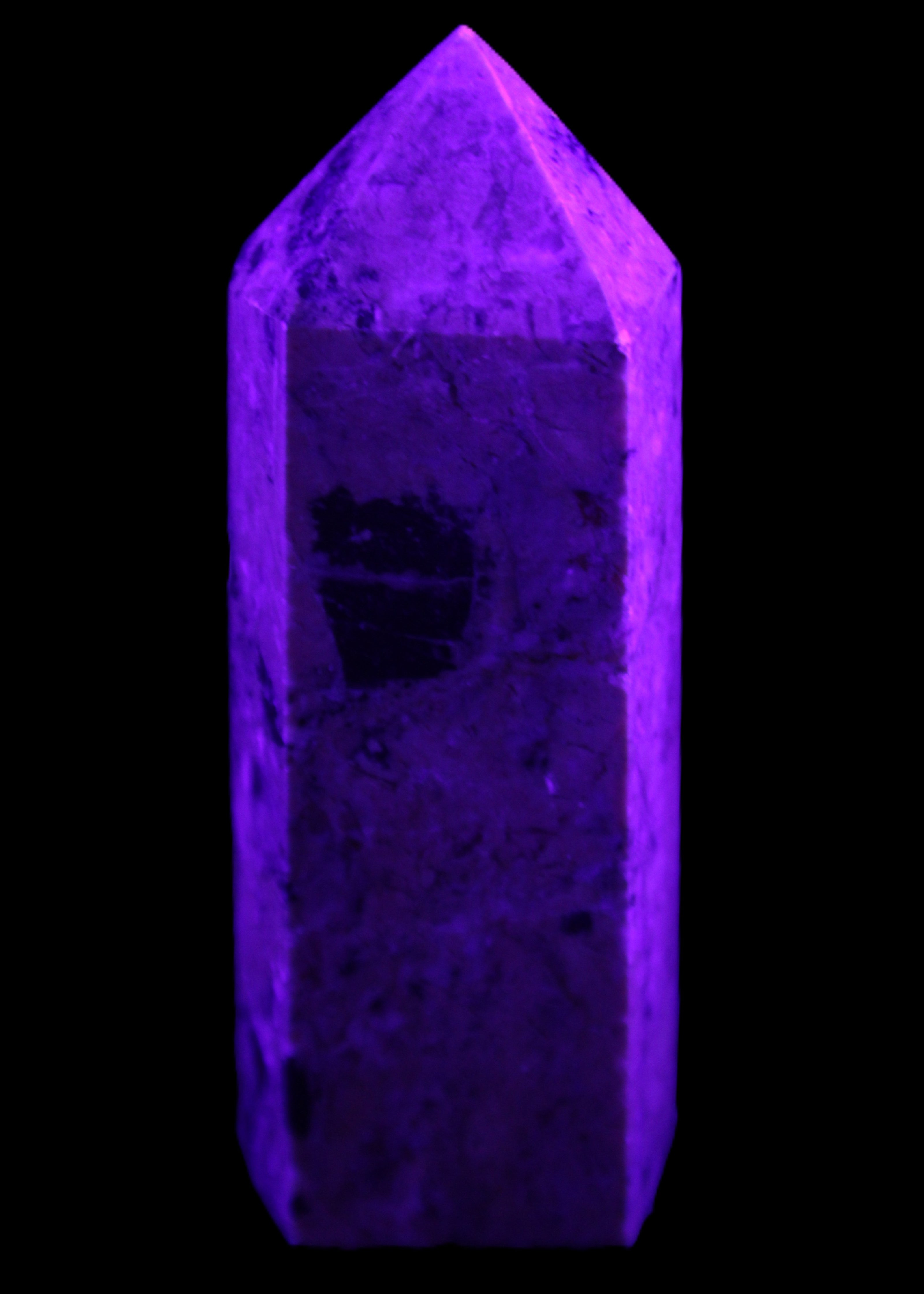 Peach Blossom Stone Rhodonite obelisk 505g in UV light -Rocks and Things Store