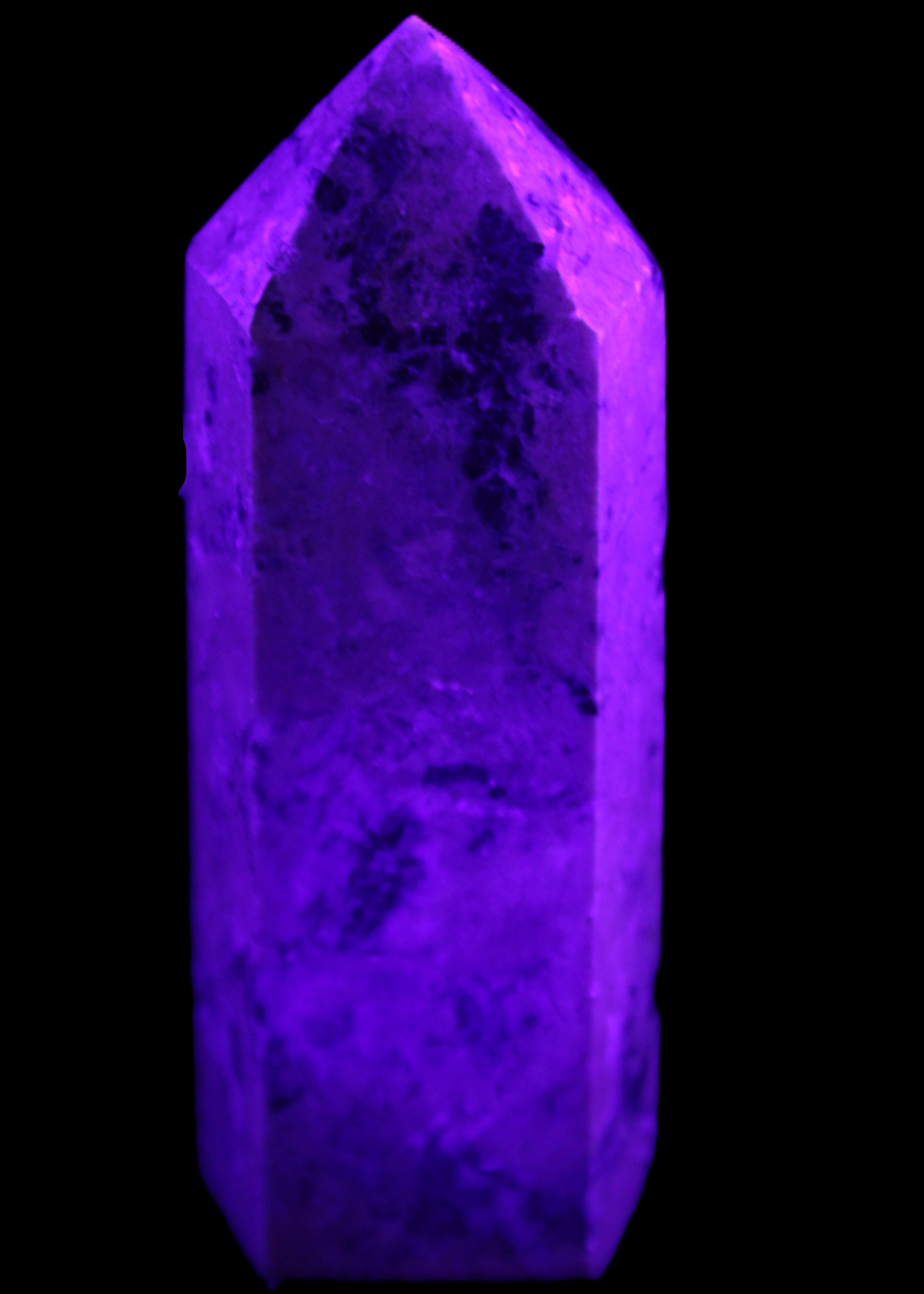 Peach Blossom Stone Rhodonite obelisk 505g in UV light -Rocks and Things Store