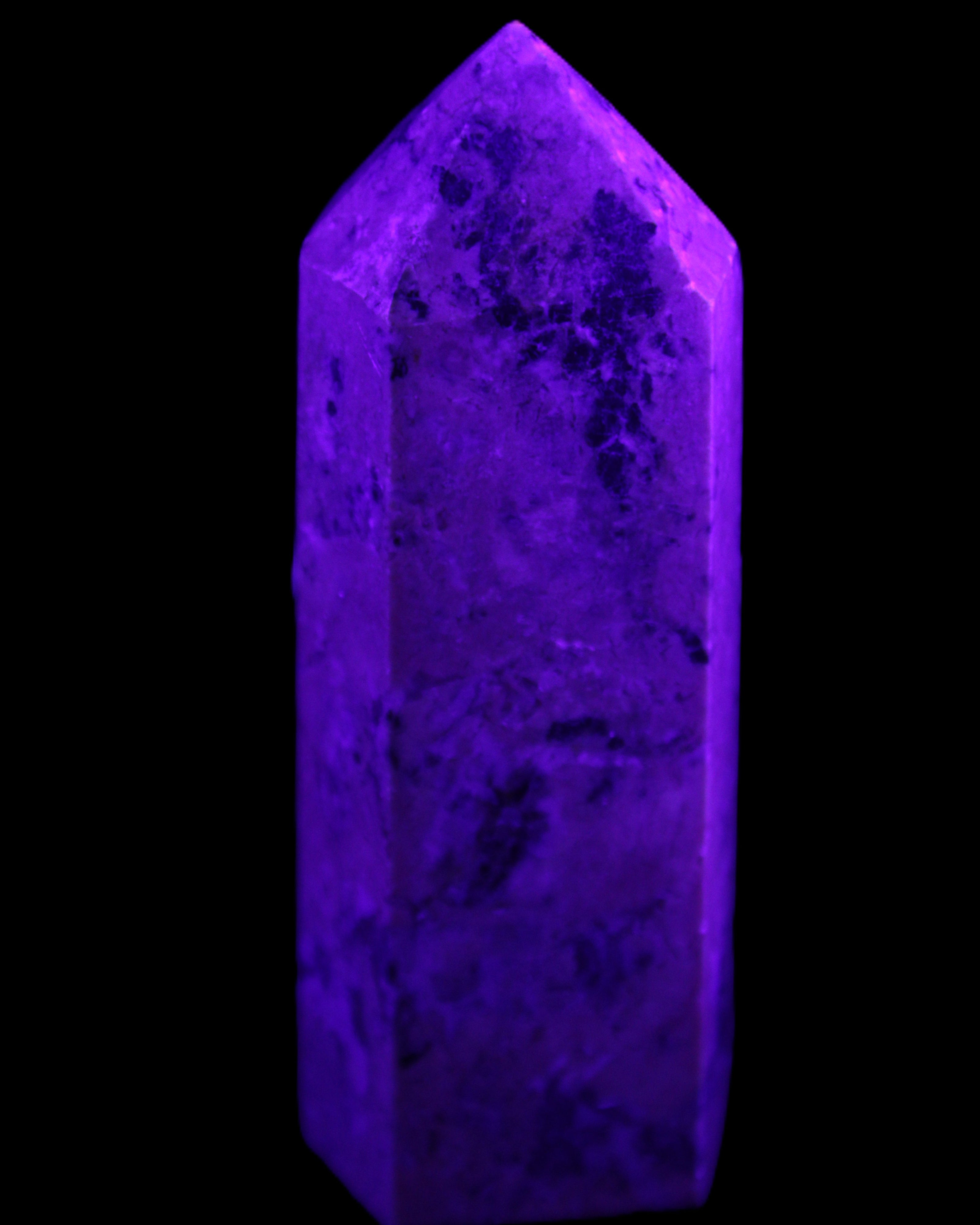 Peach Blossom Stone Rhodonite obelisk 505g in UV light -Rocks and Things Store