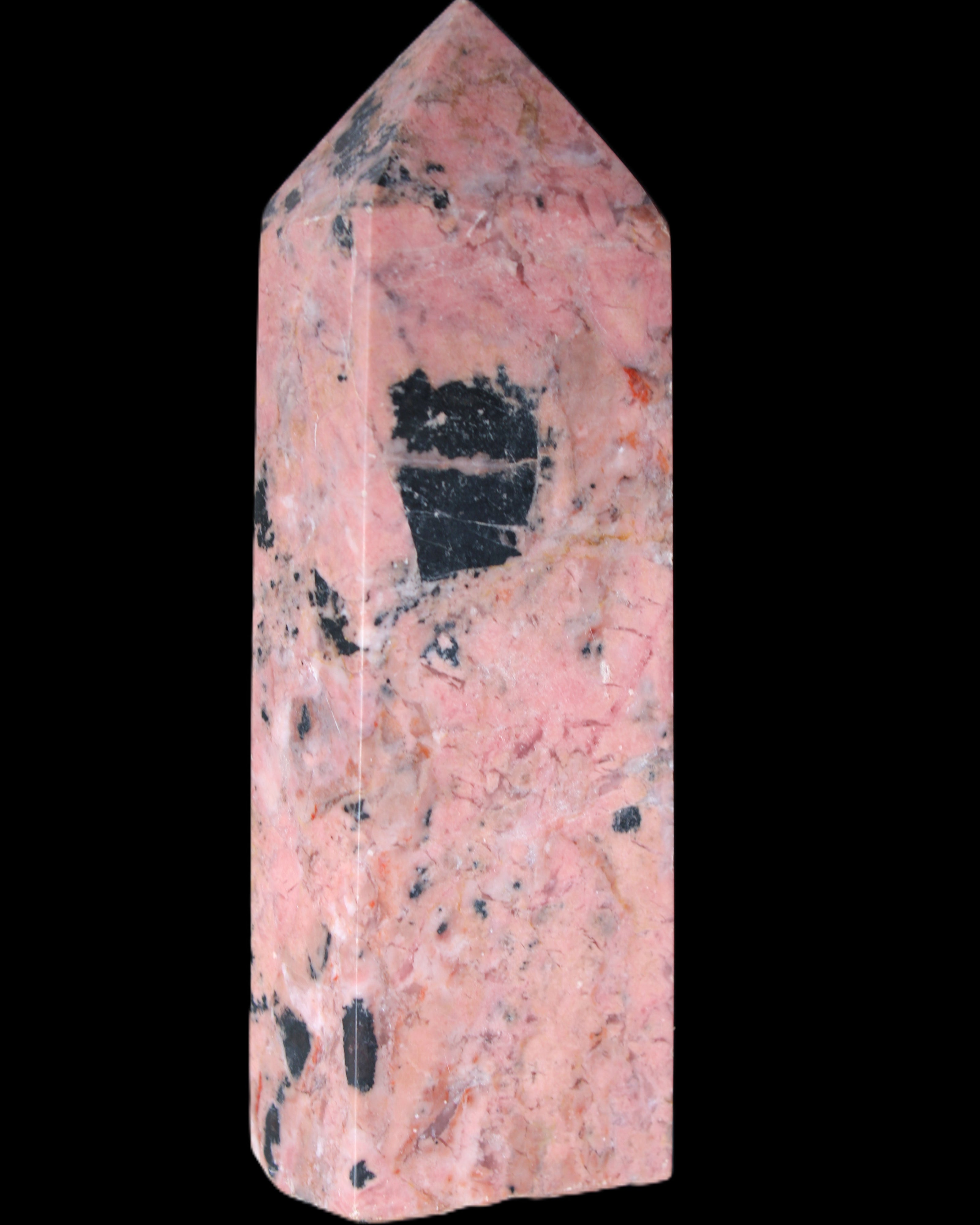 Peach Blossom Stone Rhodonite obelisk 505g in sunlight - Rocks and Things Store