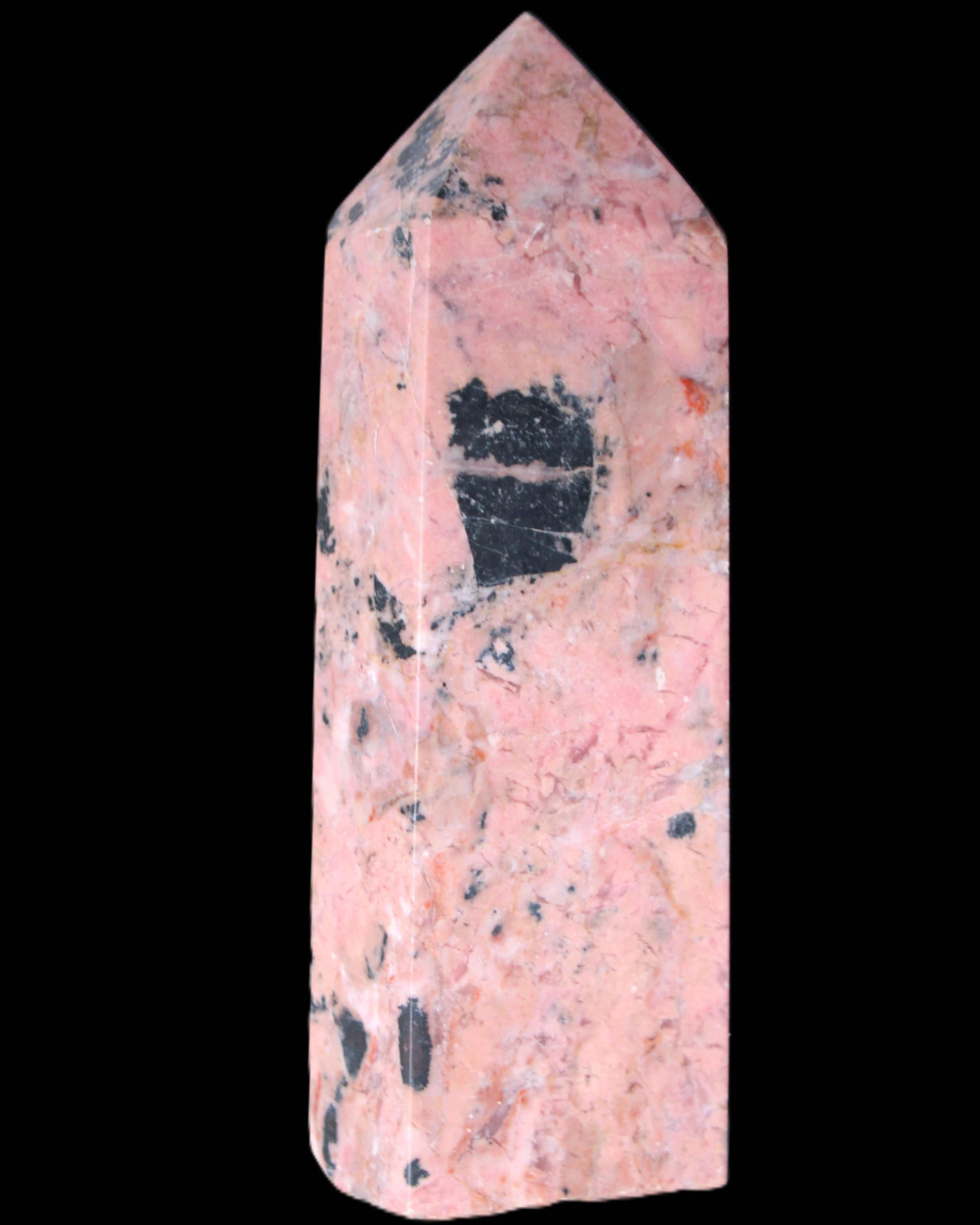 Peach Blossom Stone Rhodonite obelisk 505g in sunlight - Rocks and Things Store