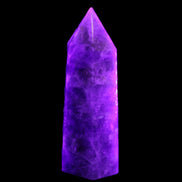 Amethyst obelisk 830g in UV light - Rocks and Things Store