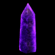 Amethyst obelisk 830g in UV light - Rocks and Things Store
