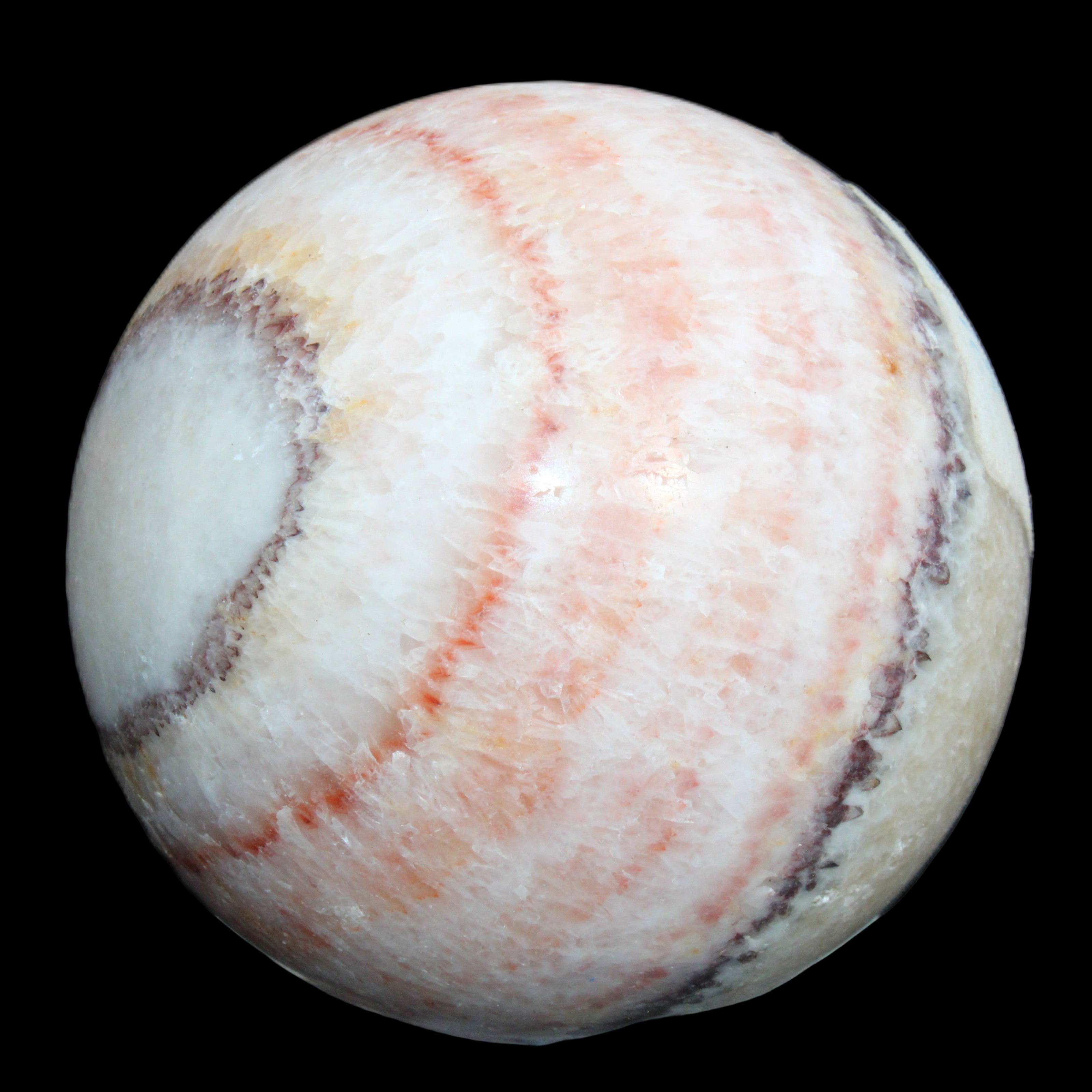Rhodochrosite sphere 320g in sunlight - Rocks and Things Store