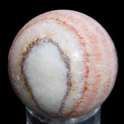 Rhodochrosite sphere 320g in sunlight - Rocks and Things Store