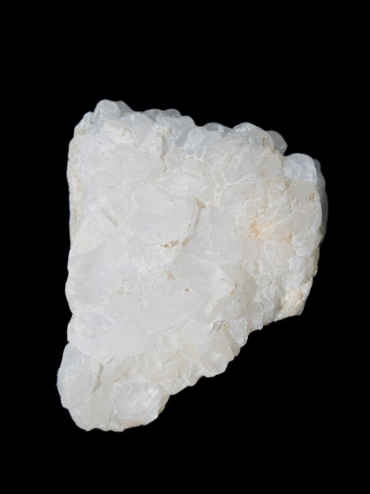 Calcite UV-reactive crystal cluster 130g in natural sunlight