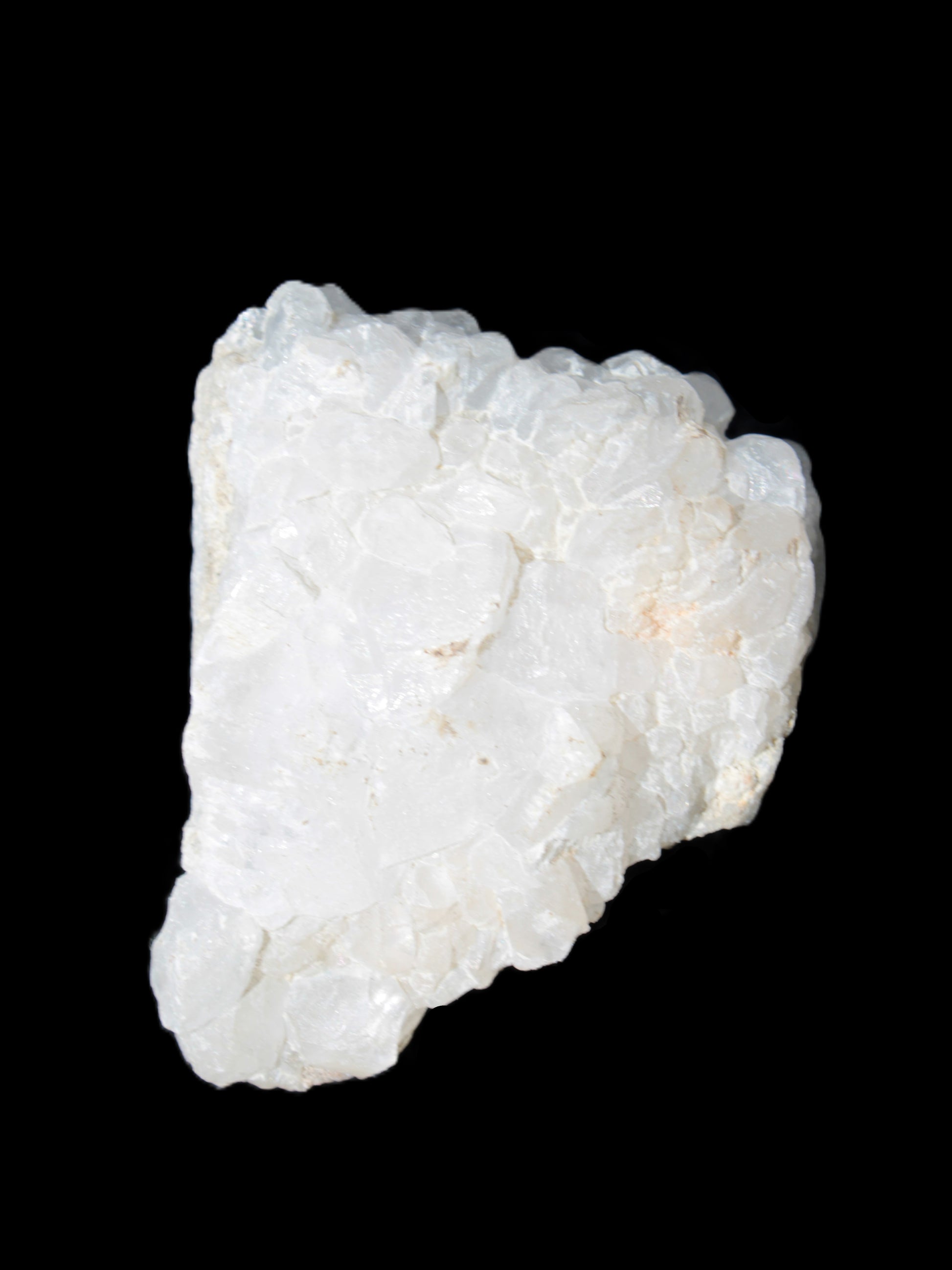 Calcite UV-reactive crystal cluster 130g in sunlight