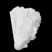 Calcite UV-reactive crystal cluster 130g in sunlight