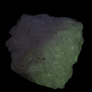 Calcite UV-reactive crystal cluster 130g in UV light 365nm