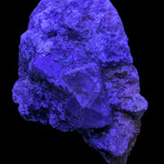 Purple Cubic ladder Fluorite with Aluminum Fluoride Gypsum 272g in UV light - Rocks and Things Store