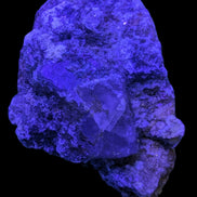 Purple Cubic ladder Fluorite with Aluminum Fluoride Gypsum 272g in UV light - Rocks and Things Store