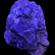 Purple Cubic ladder Fluorite with Aluminum Fluoride Gypsum 272g in UV light - Rocks and Things Store