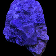 Purple Cubic ladder Fluorite with Aluminum Fluoride Gypsum 272g in UV light - Rocks and Things Store