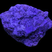 Purple Cubic ladder Fluorite with Aluminum Fluoride Gypsum 272g in UV light - Rocks and Things Store
