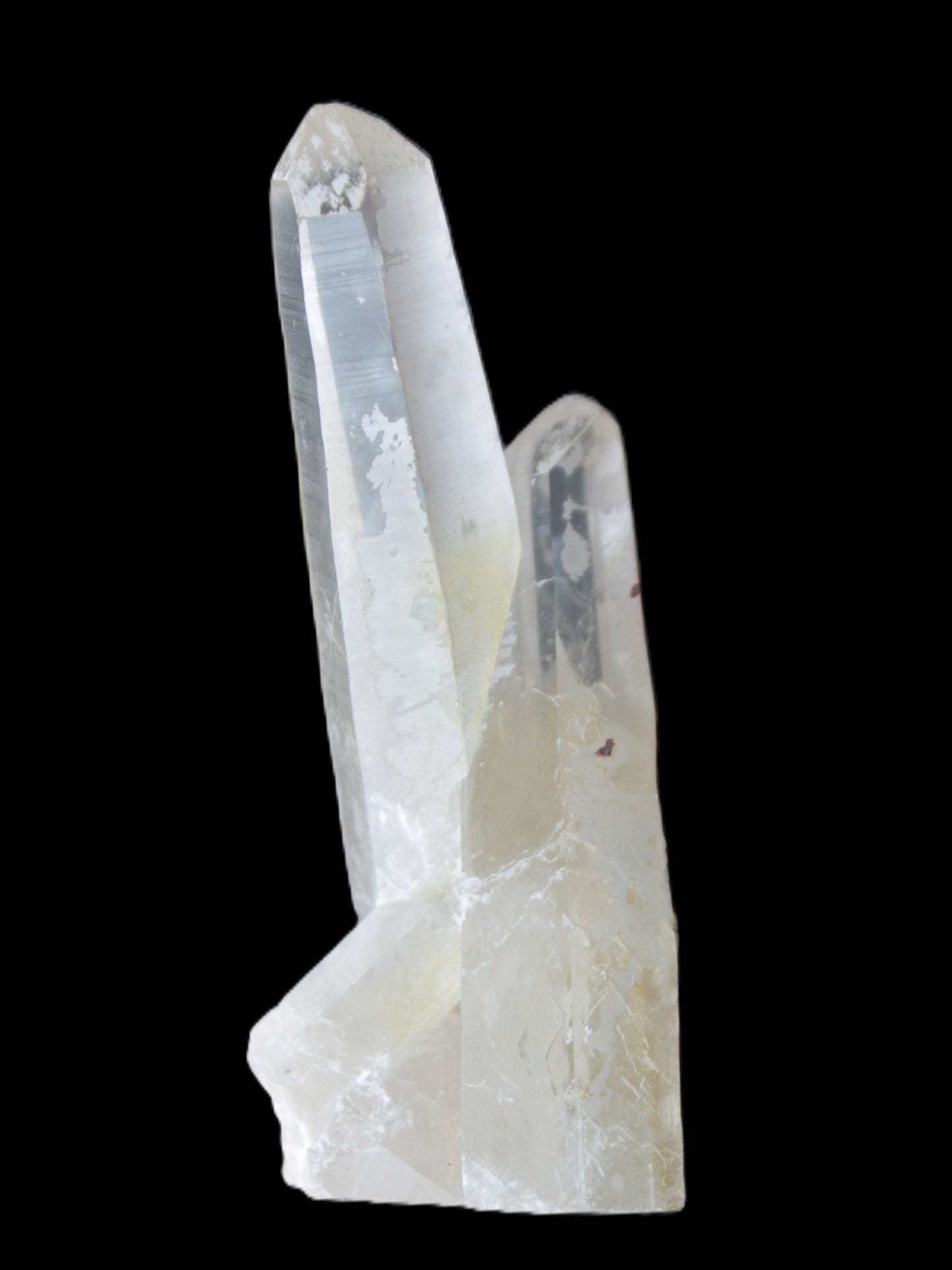 Quartz backbone crystal cluster 93mm 89g in sunlight