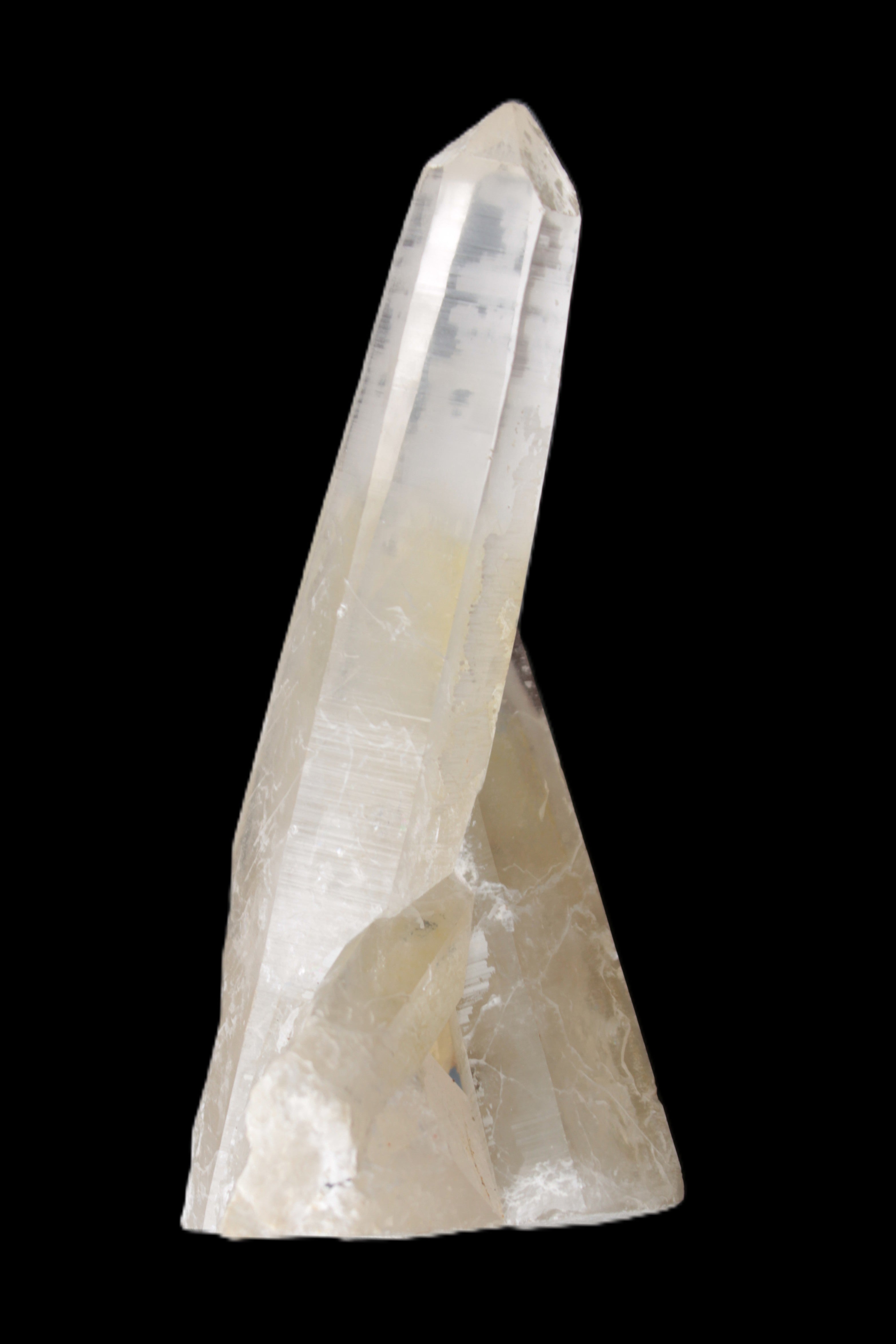 Quartz backbone crystal cluster 93mm 89g in sunlight
